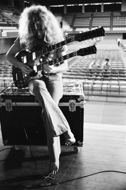 Jimmy Page taking a picture of Robert Plant during their 1971 tour