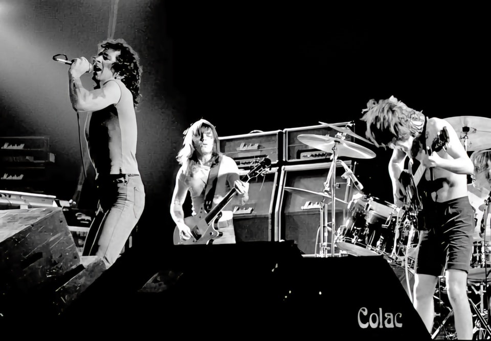AC⚡DC perform live on stage in Copenhagen, Denmark, 1977. Picture