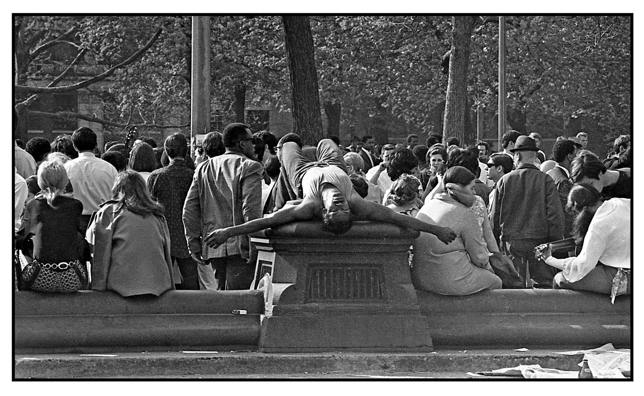 1969. Reading in Washington Square Park. Andre Kertesz, photog.