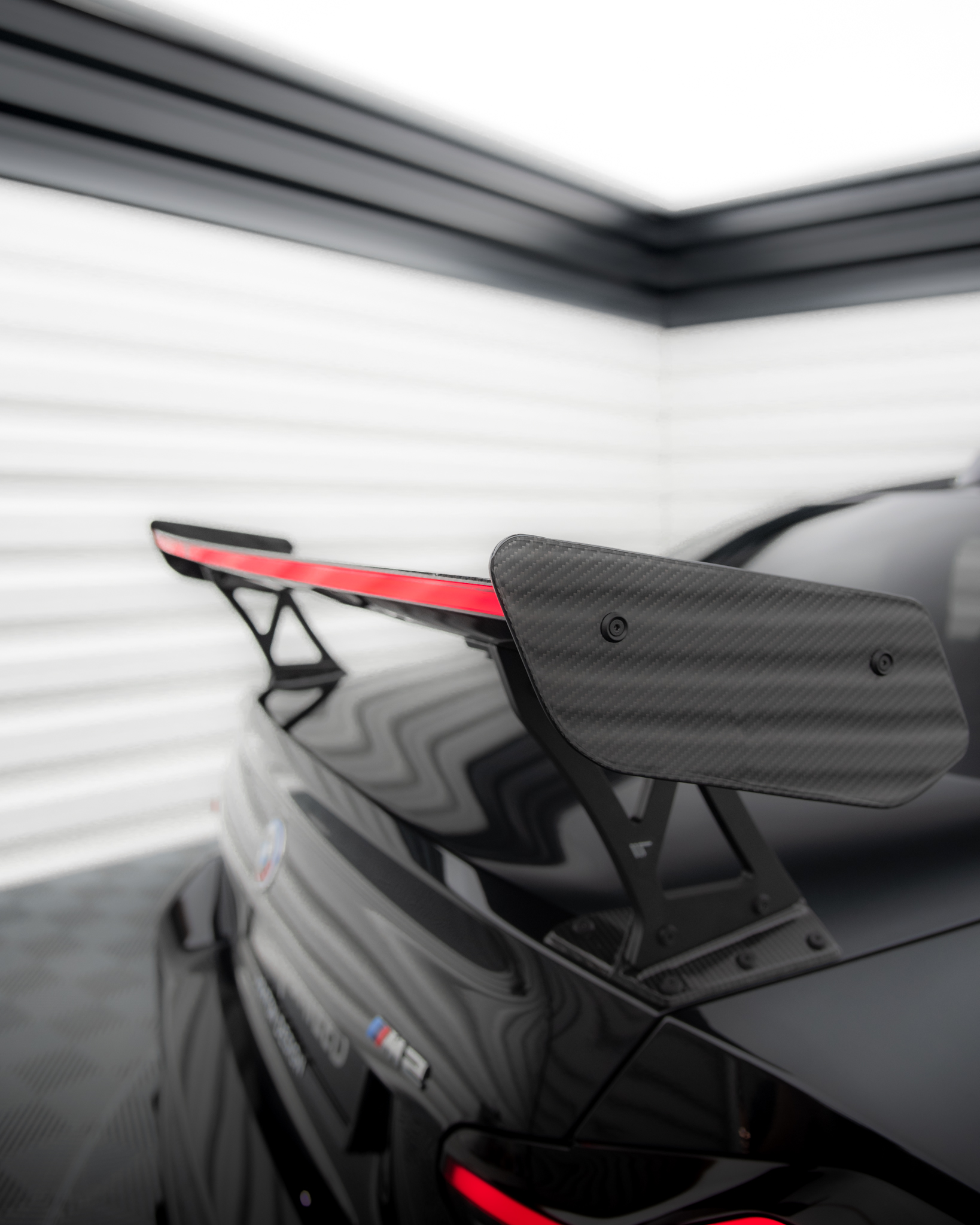 Maxton Design - A carbon wing spoiler with LED light is... | Facebook