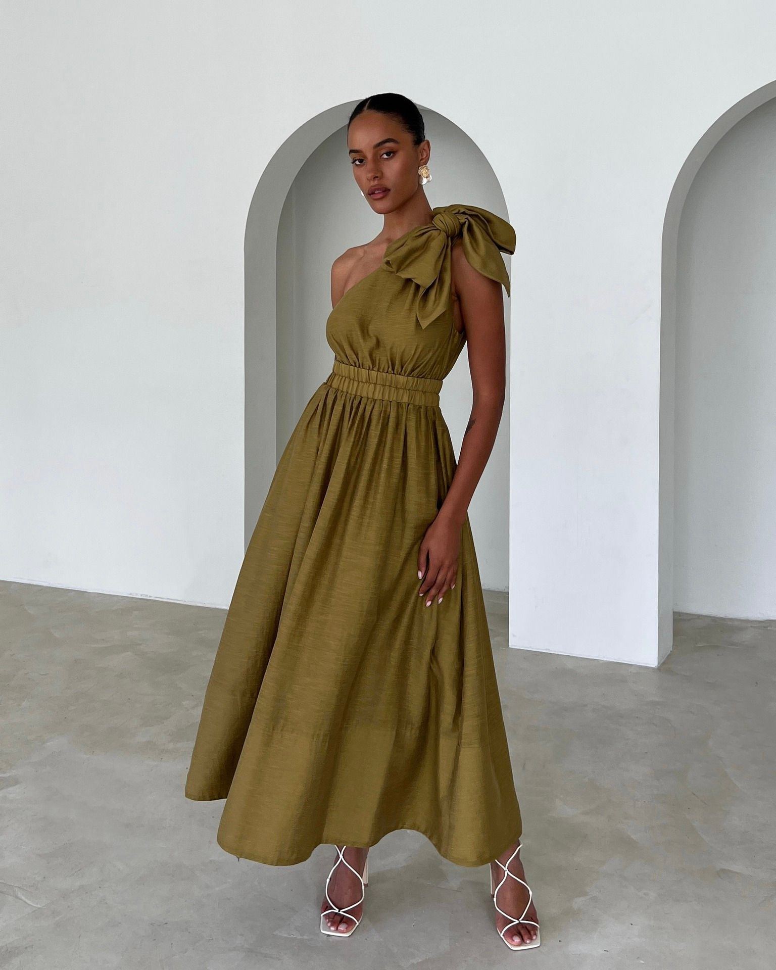 Effortless elegance ✨ Introducing our Gemma Dress showcasing a relaxed fit, one shoulder cut and detachable bow detailing #sheike