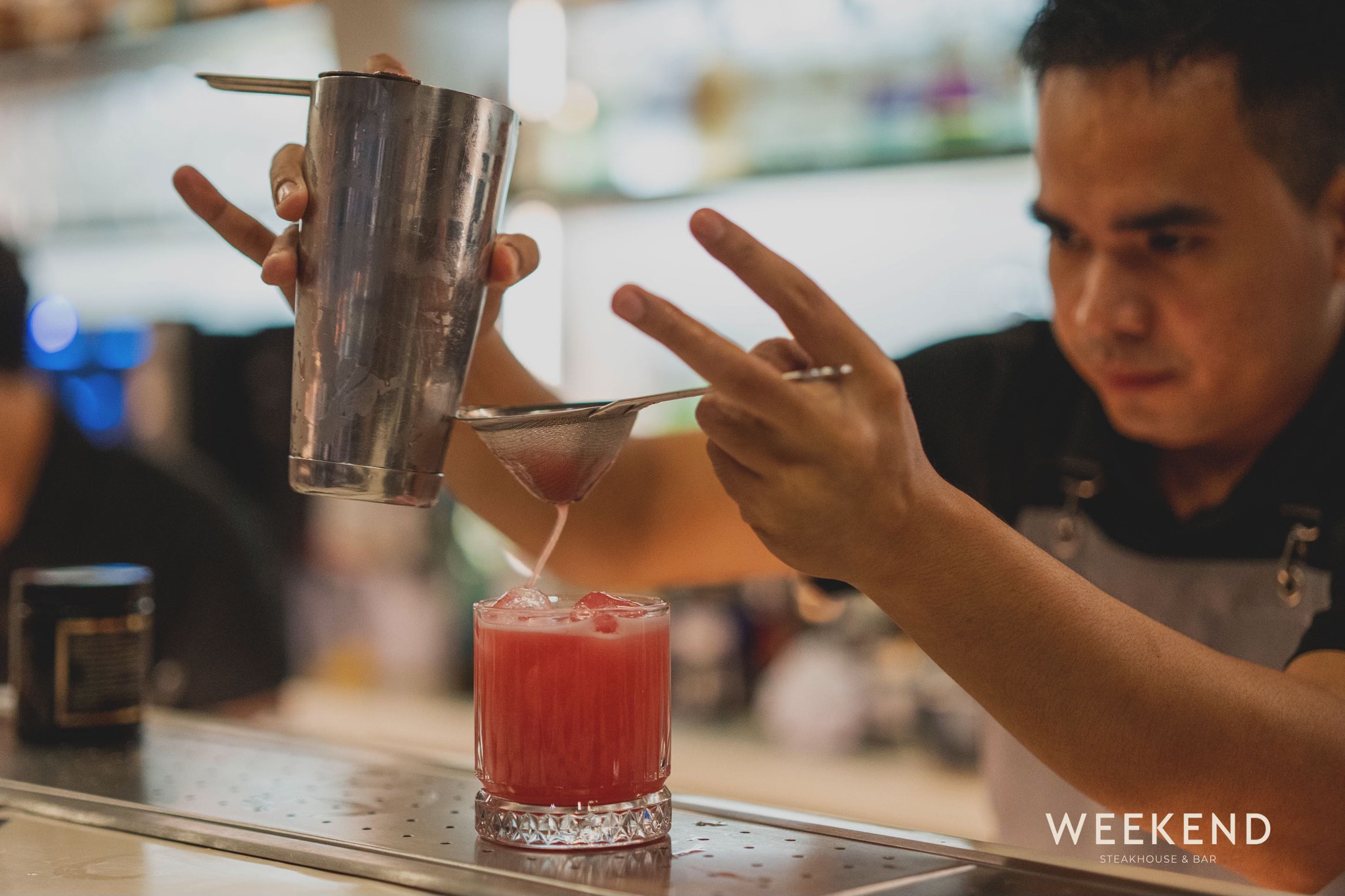 WEEKEND - A bar where patrons actually sit at, and enjoy carefully ...