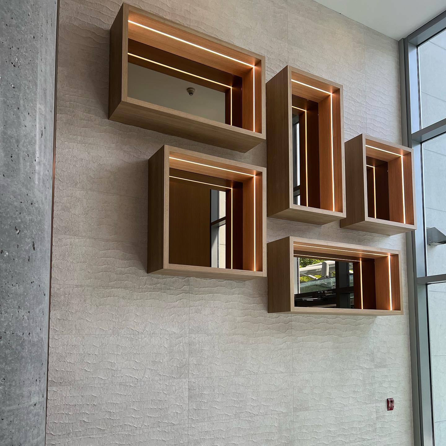 Western - Custom lighting in these smoke mirrored millwork boxes ...