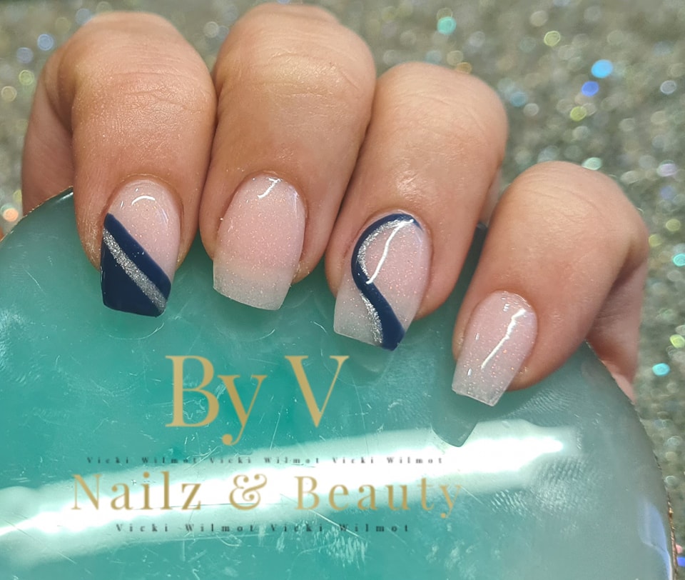 Navy blue wedding nail ideas with silver accents