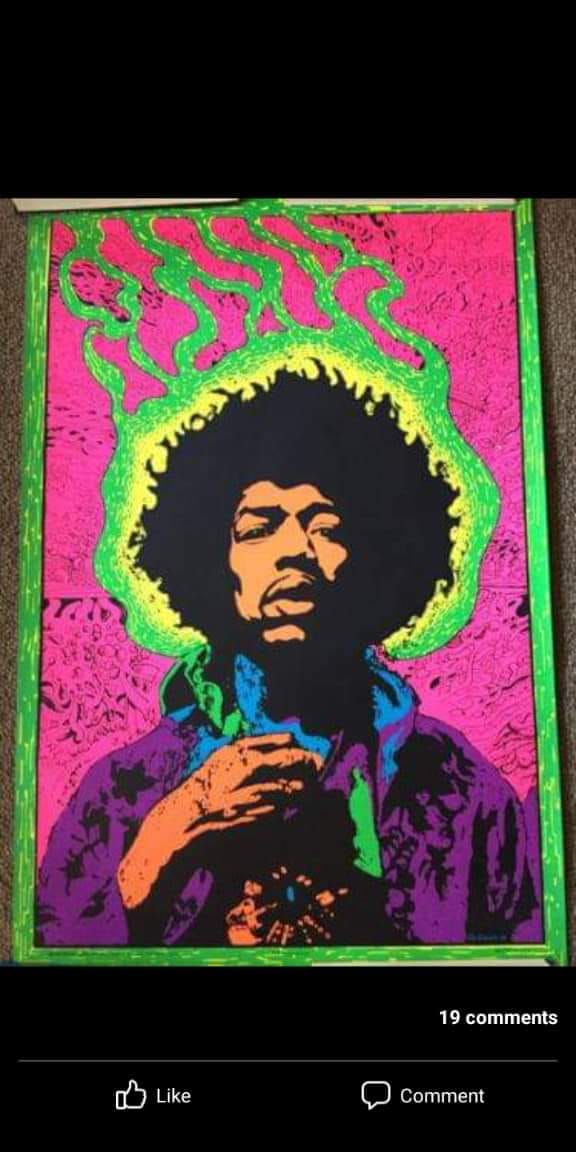 Here is a black light poster, of an image of Jimi Hendrix, from