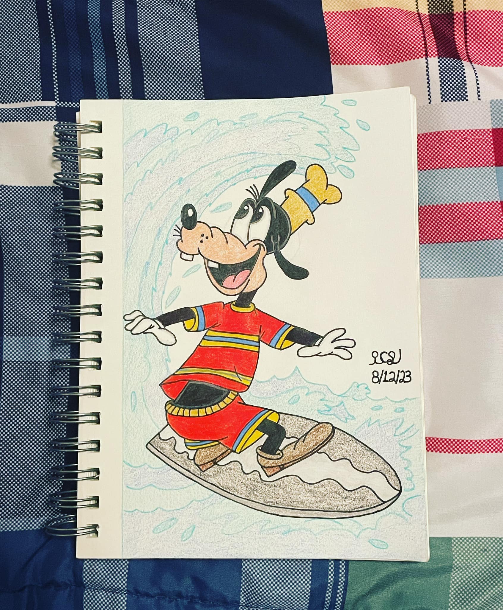 TANDEM SURFING. Mickey and Minnie take on Waikiki waves in this
