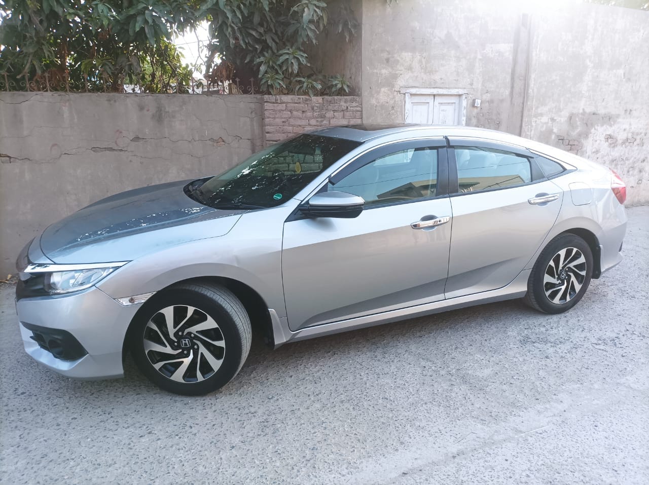 Sialvi Motors, Property And Rent A Cars Toba Road Jhang Sadar. Home