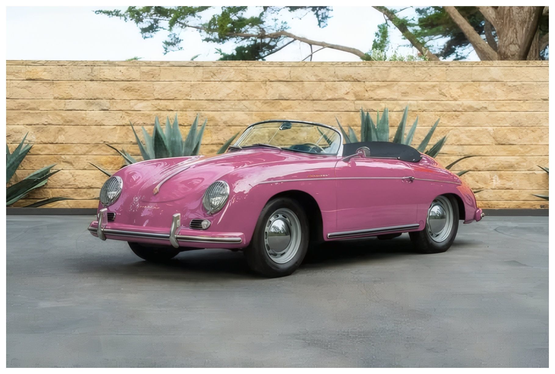 1957 Porsche 356 Speedster in a glossy silver finish.