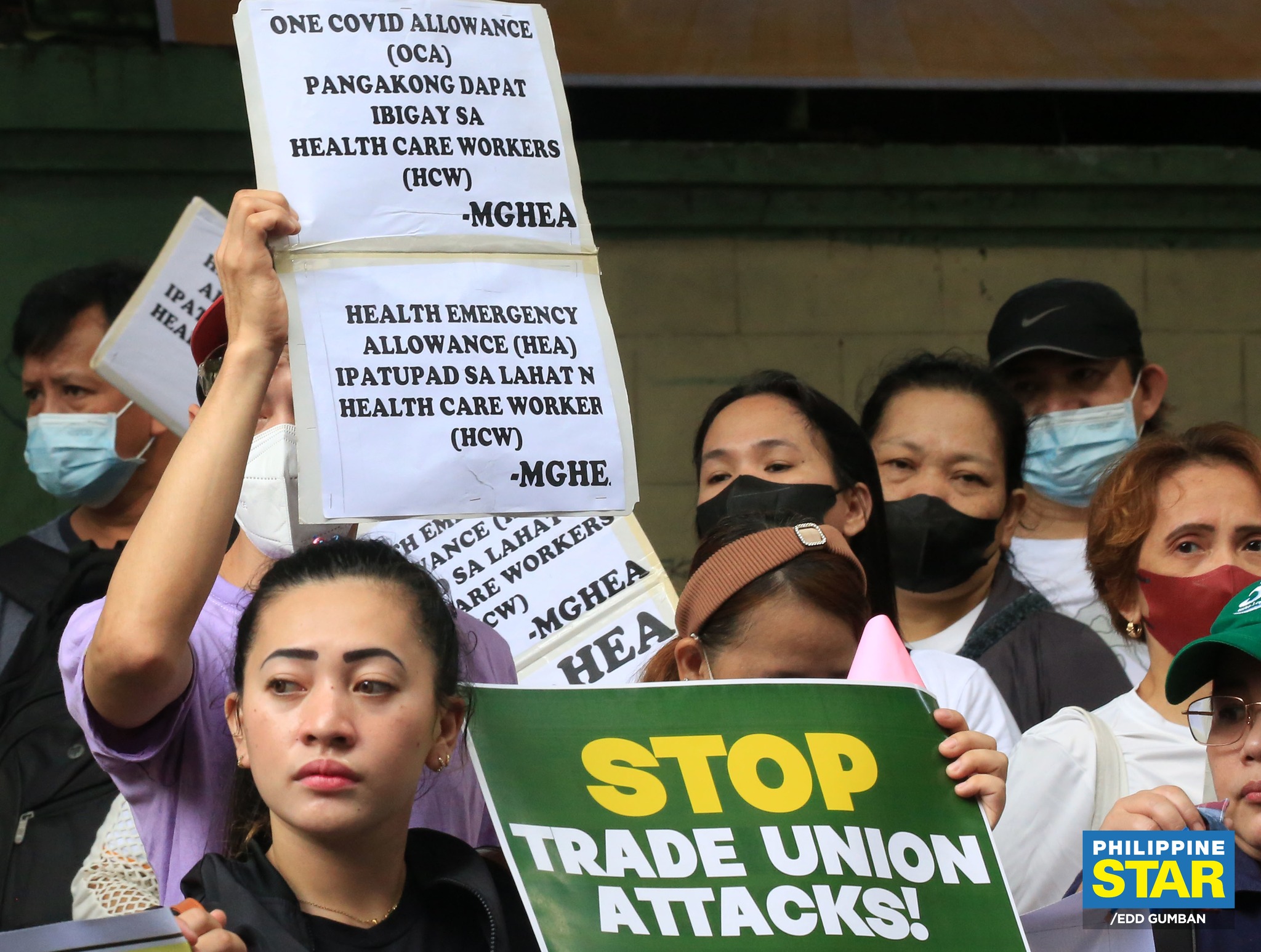 Philippine - Healthcare workers stage a protest rally in front of the ...