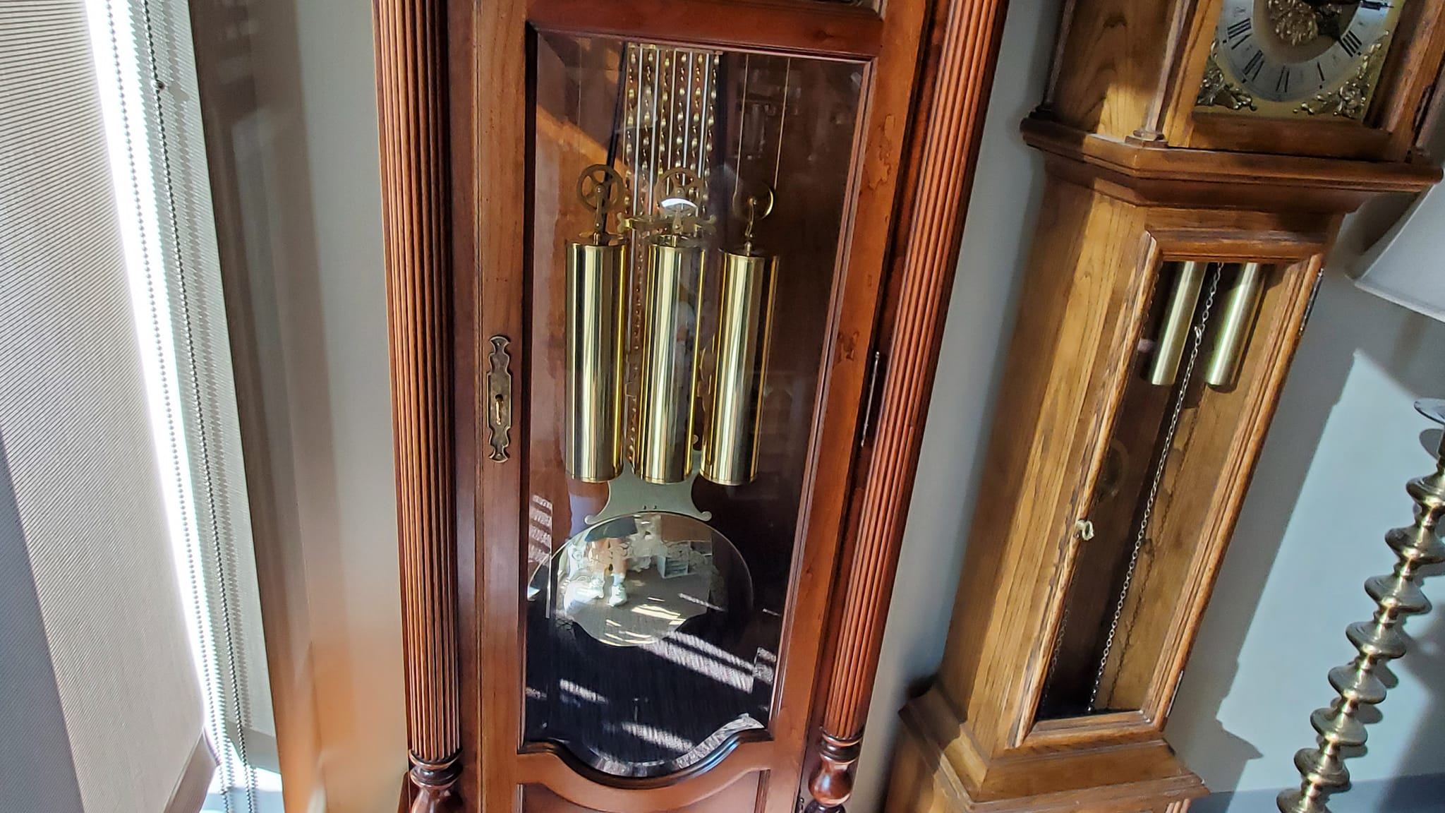 Cable-driven grandfather clock with triple chime movement