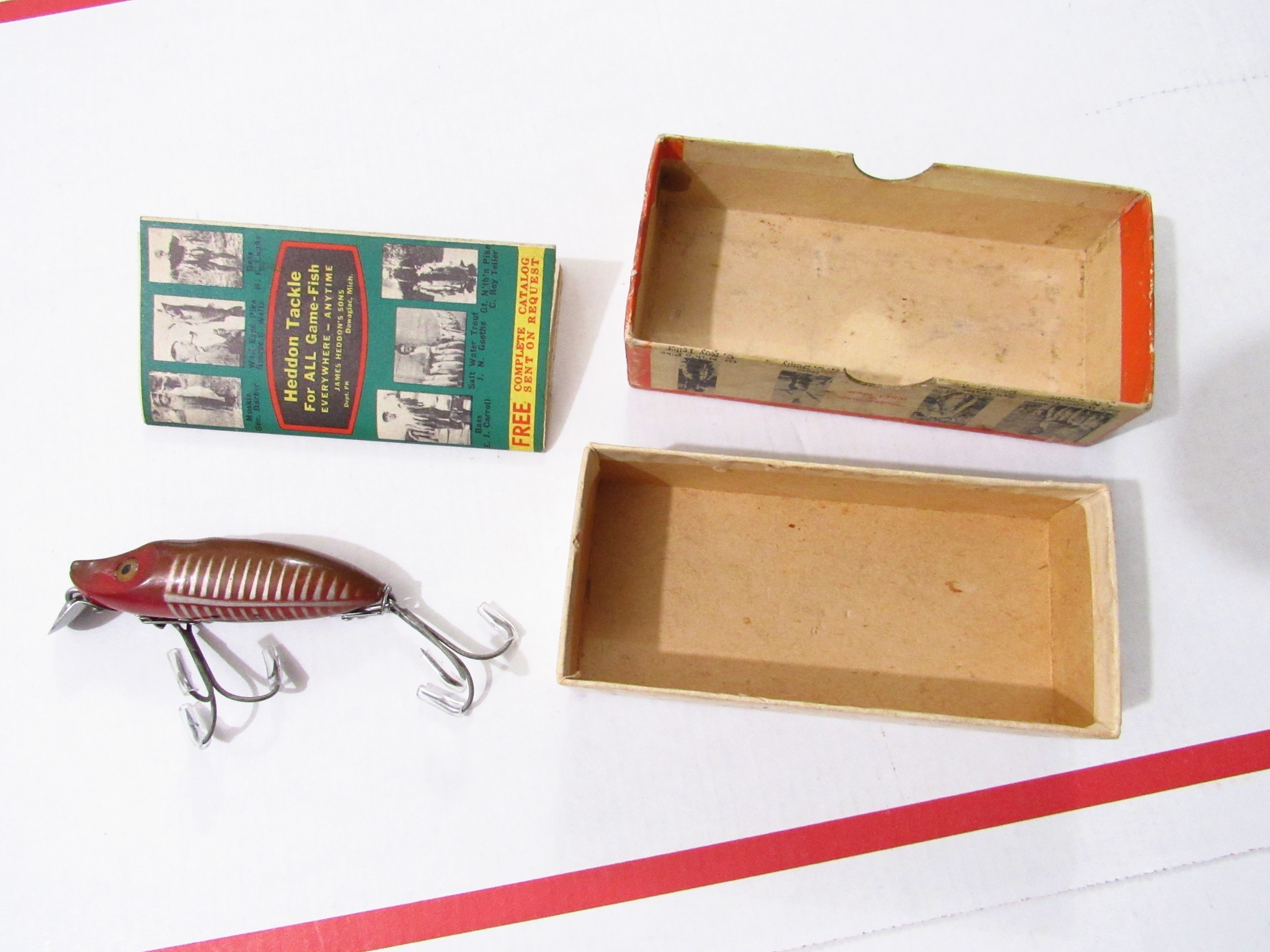 The Heddon Improved Hedd Plug 8800 Series WSB 3E 5/8 oz. is a