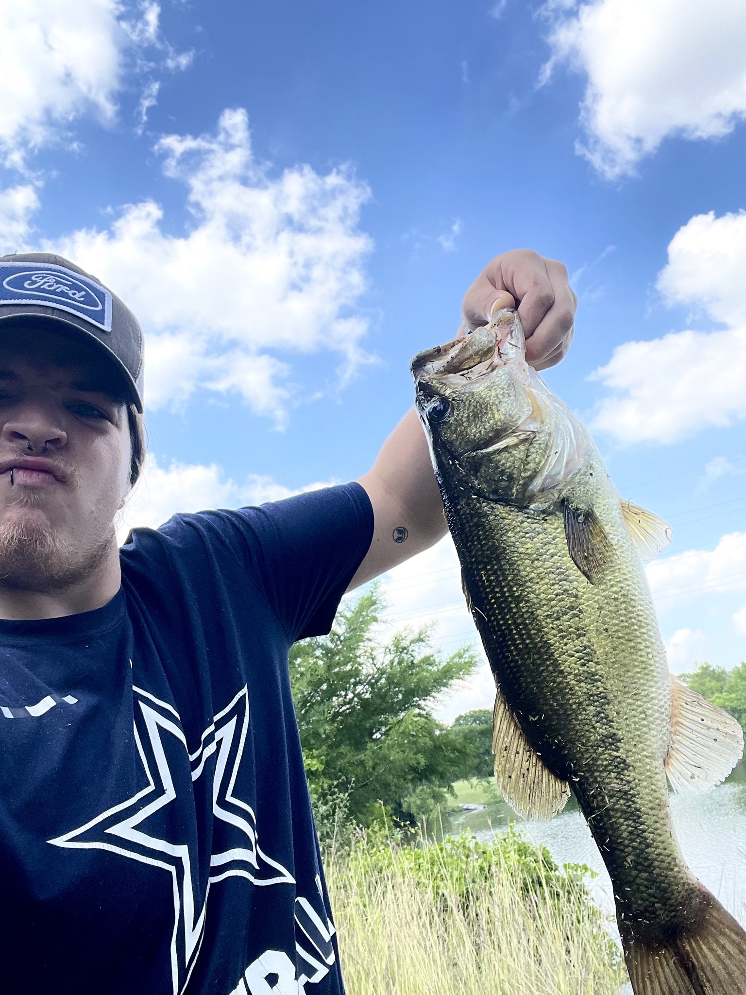 Jason Herzog catches monster bass in pond fishing