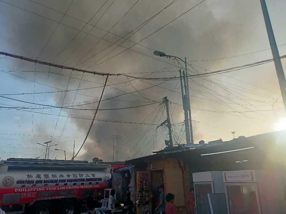 Philippine Star - Firefighters respond to a fourth-alarm...