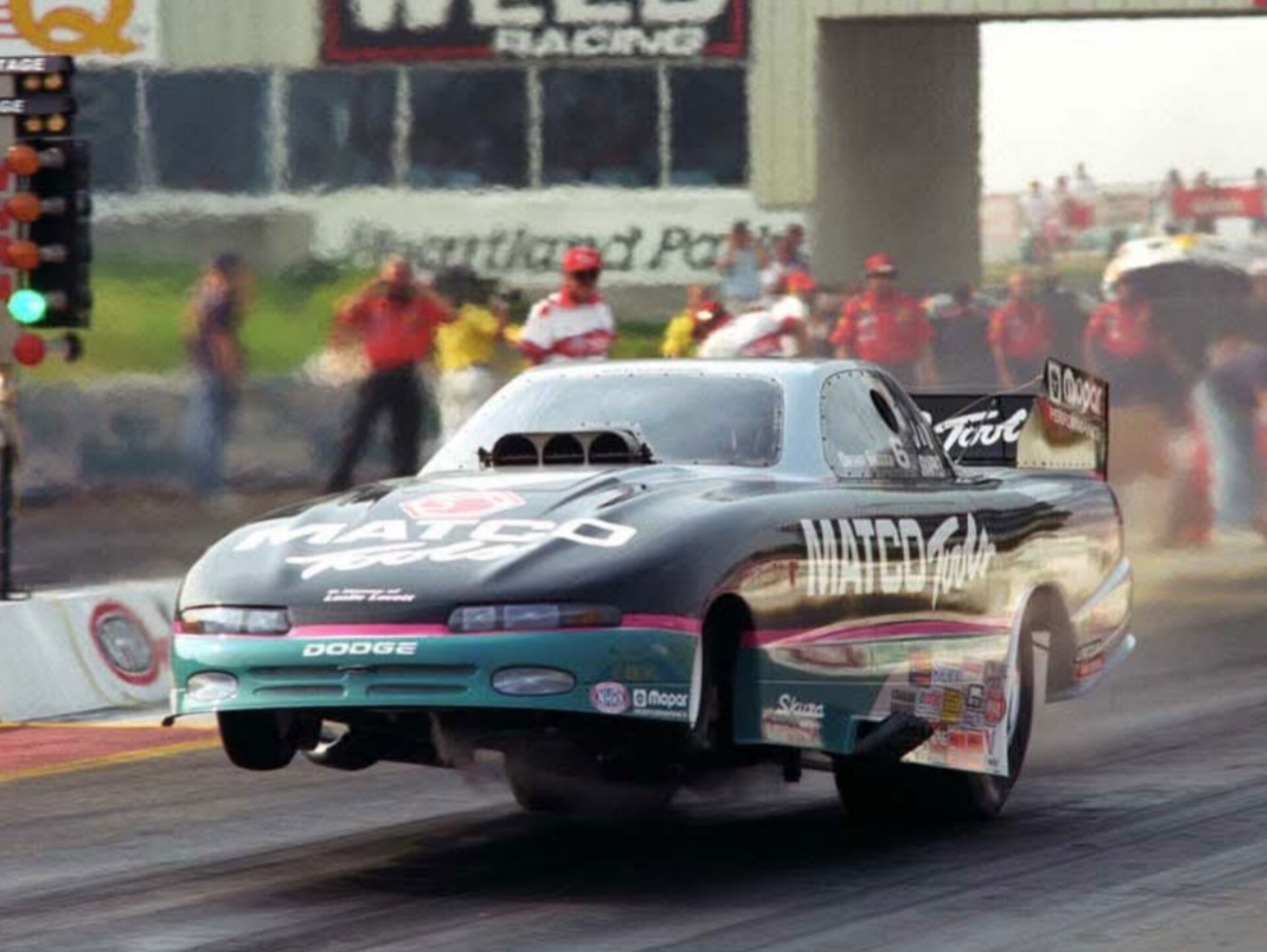 Drag - Dean Skuza putting the wheelie bar to use in his Matco Tools ...