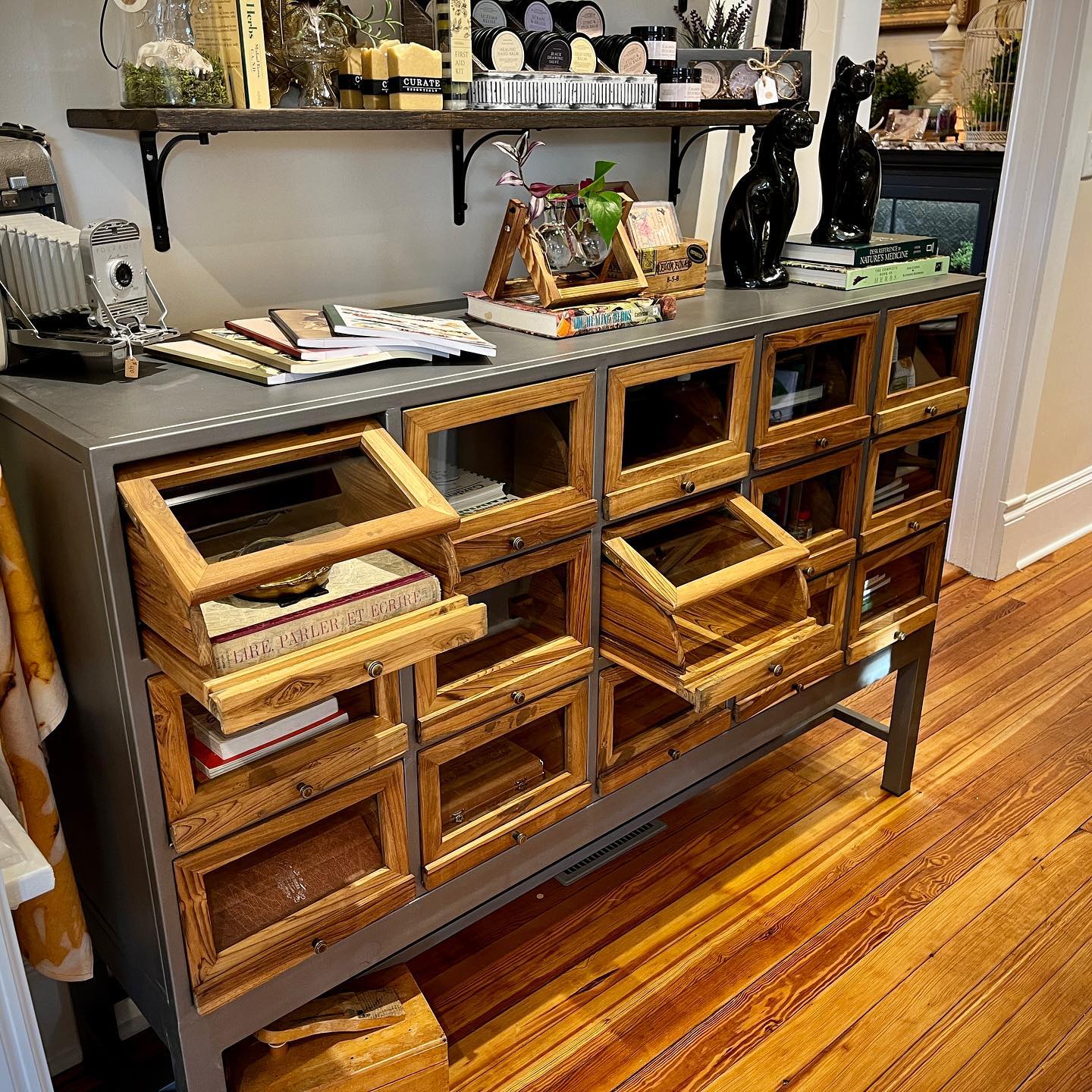 This beautiful metal and teak... - Curate Essentials