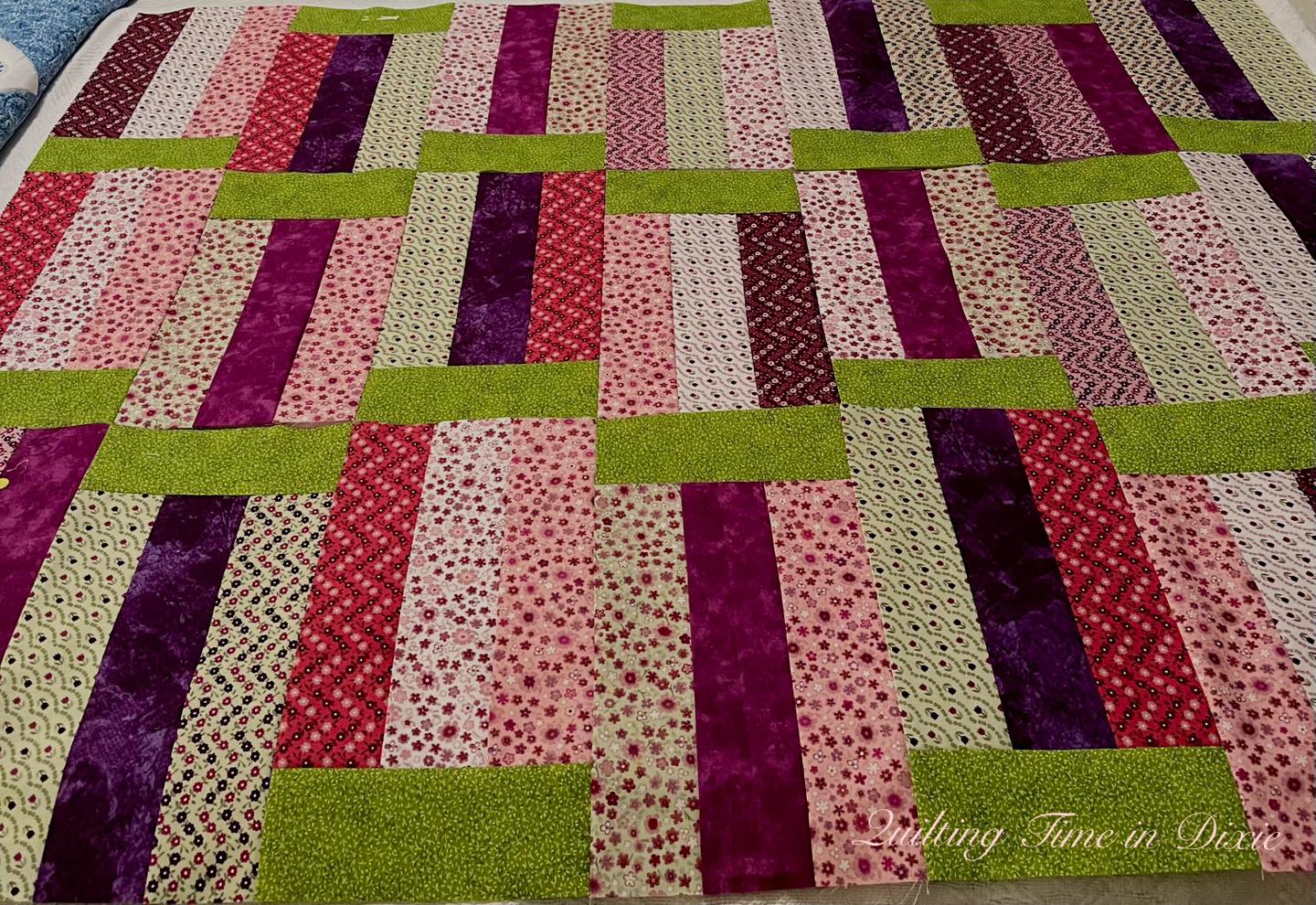 Hanging Gardens quilt with Essence of Pearl purple jelly roll