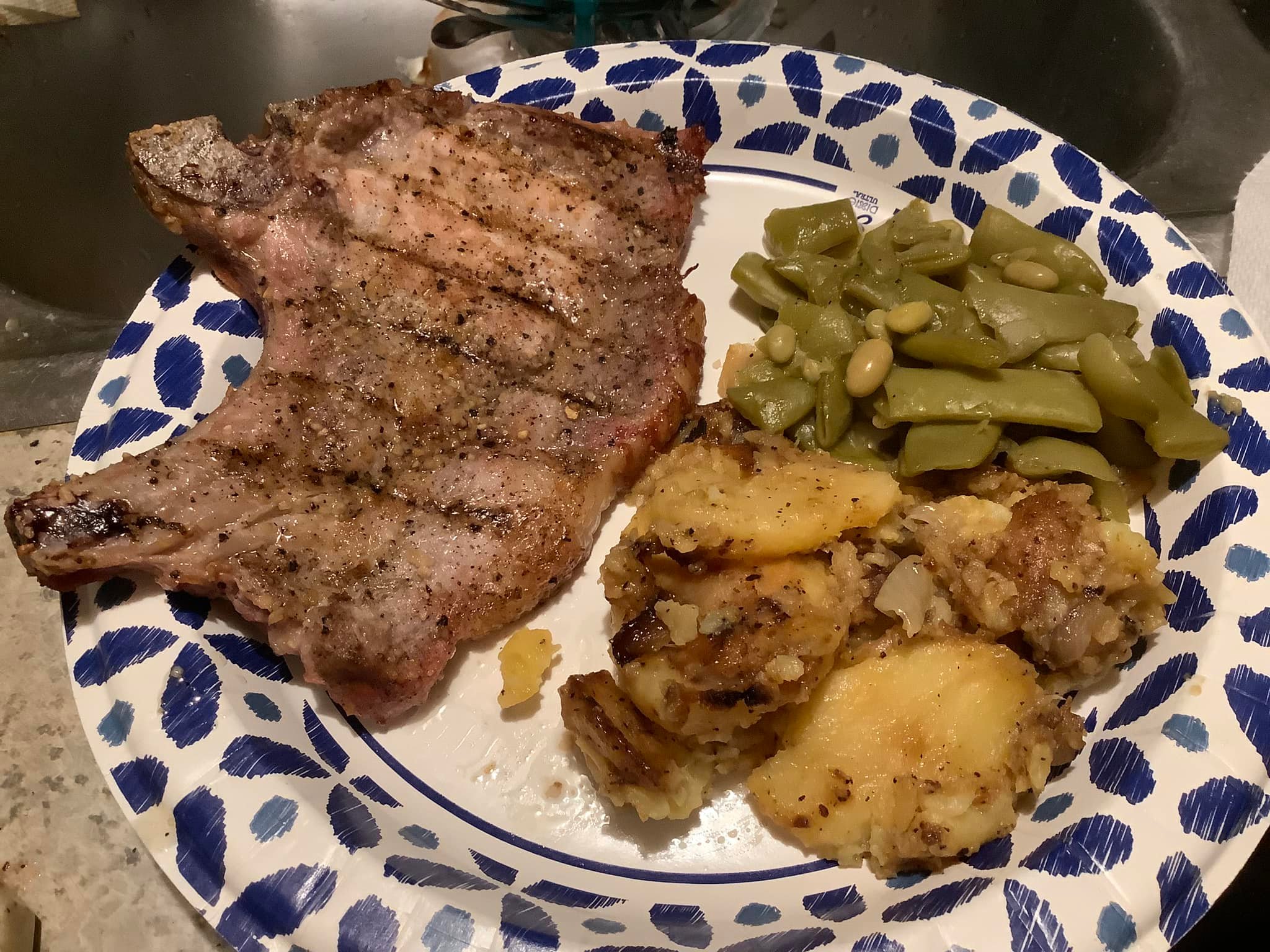Grilled pork chops with Italian green beans and potatoes