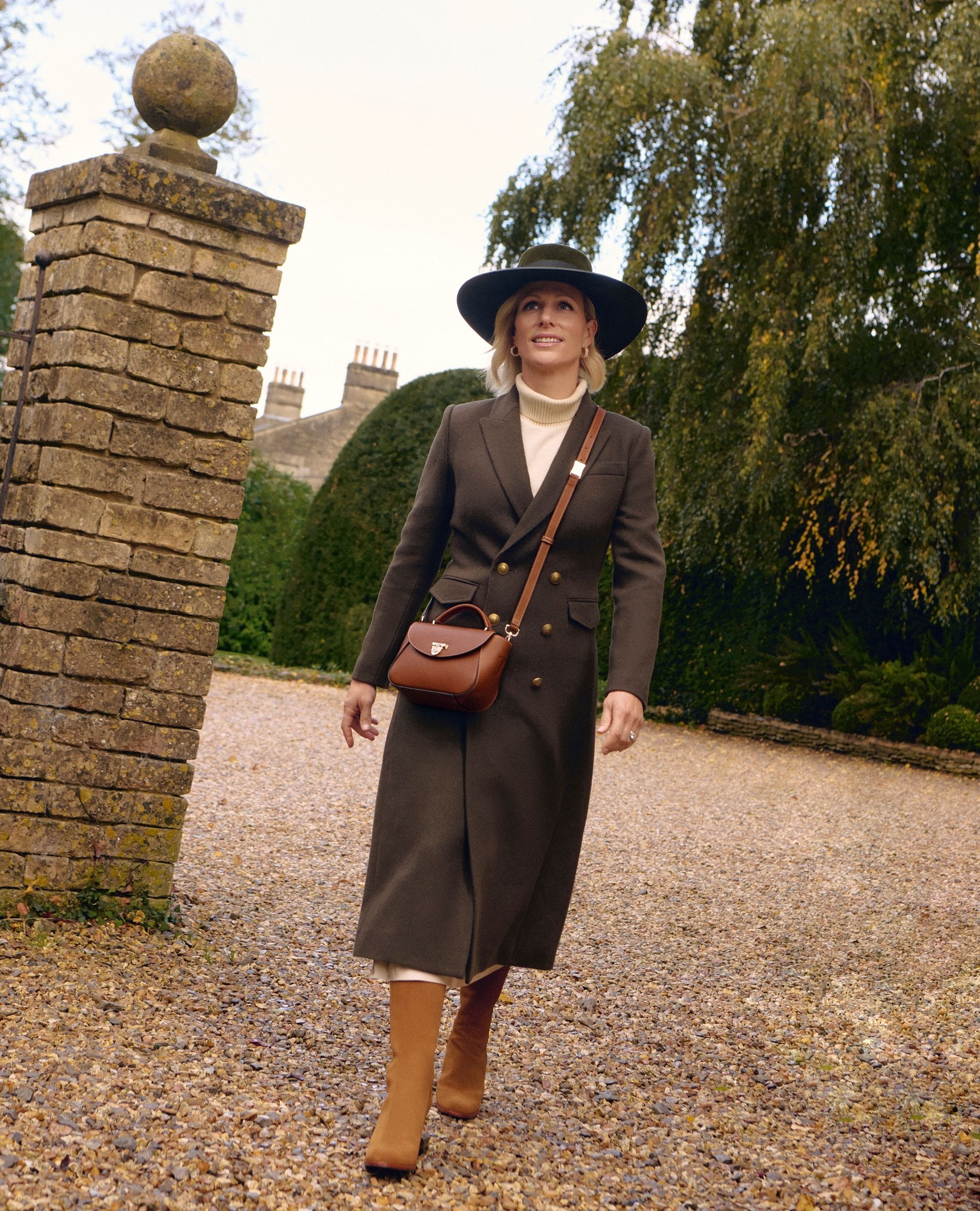 Our brand ambassador Zara Tindall wears our Cecily Coat in Biscuit