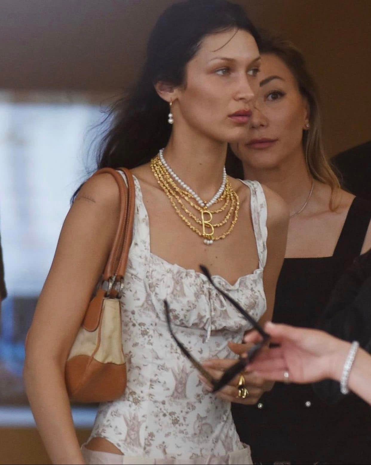bella hadid gold necklace dress Supermodel recently wore a with an oversized “B” charm from which three teardrop pearls dangled… compelling many to search Google and try to figure out where the original had Women_dresses