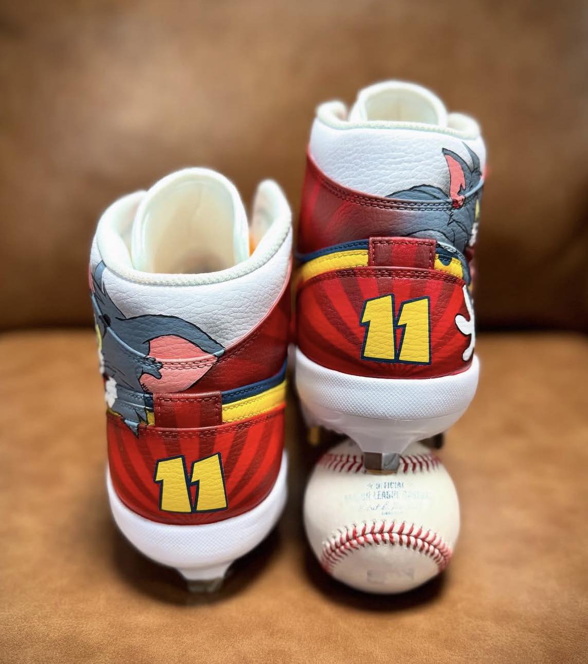Orlando Arcia's custom Tom & Jerry cleats