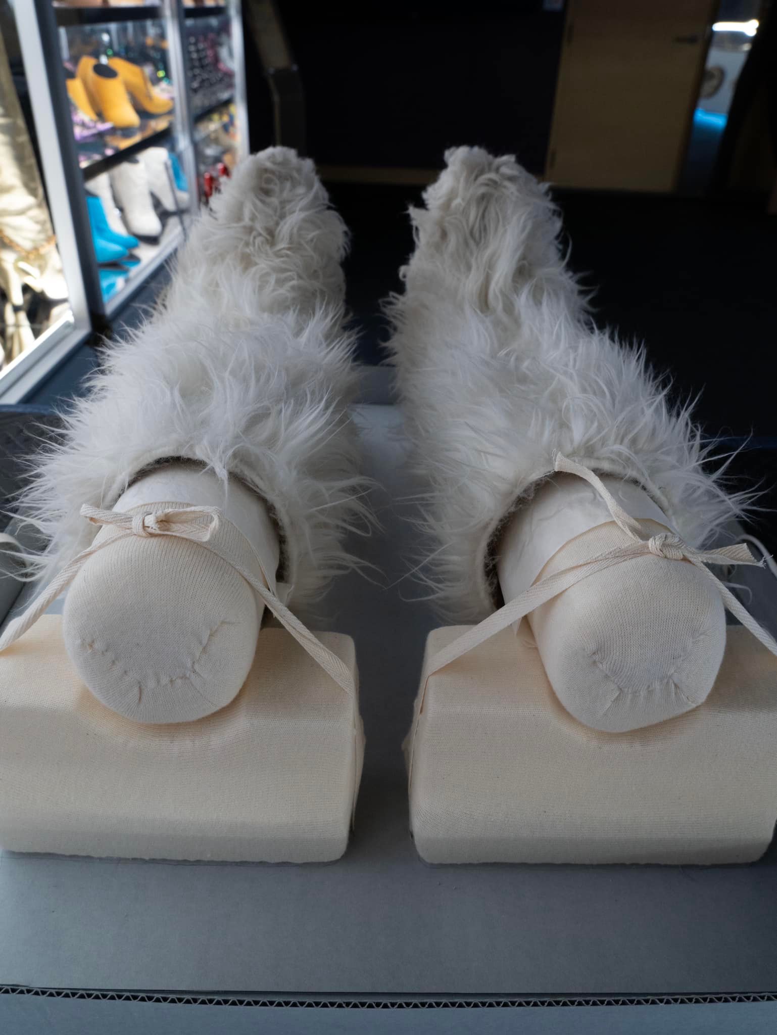 On display now, featured next to the Welcome 2 America furry boots