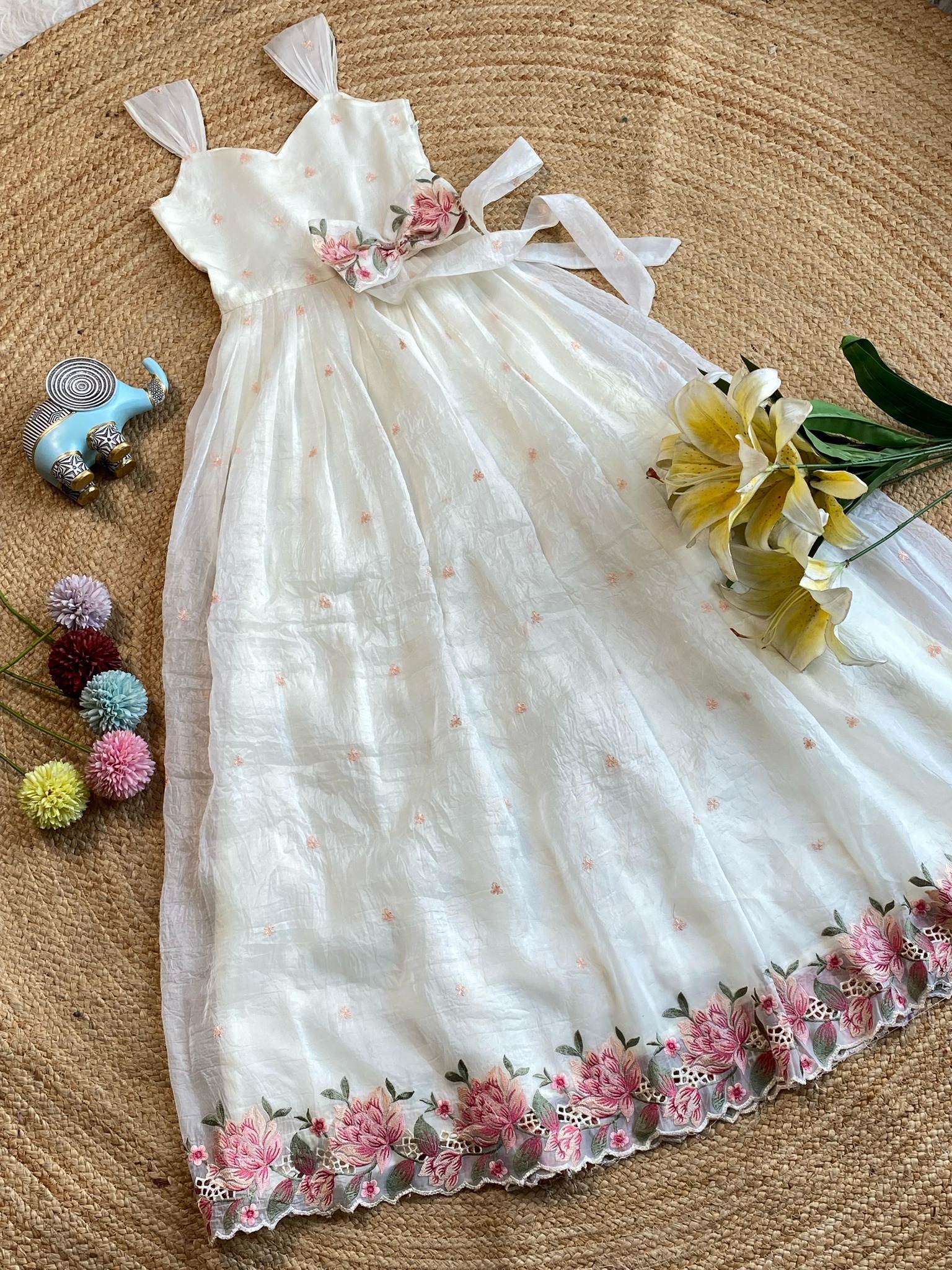 To Order Whatsapp https://wa.me/919704293939 Delicate and dreamy, this crush organza dress features elegant thread embroidery and a bow tie-up, perfect for any special day💕 Available in four beautiful colors✨ Fabric :- gold
