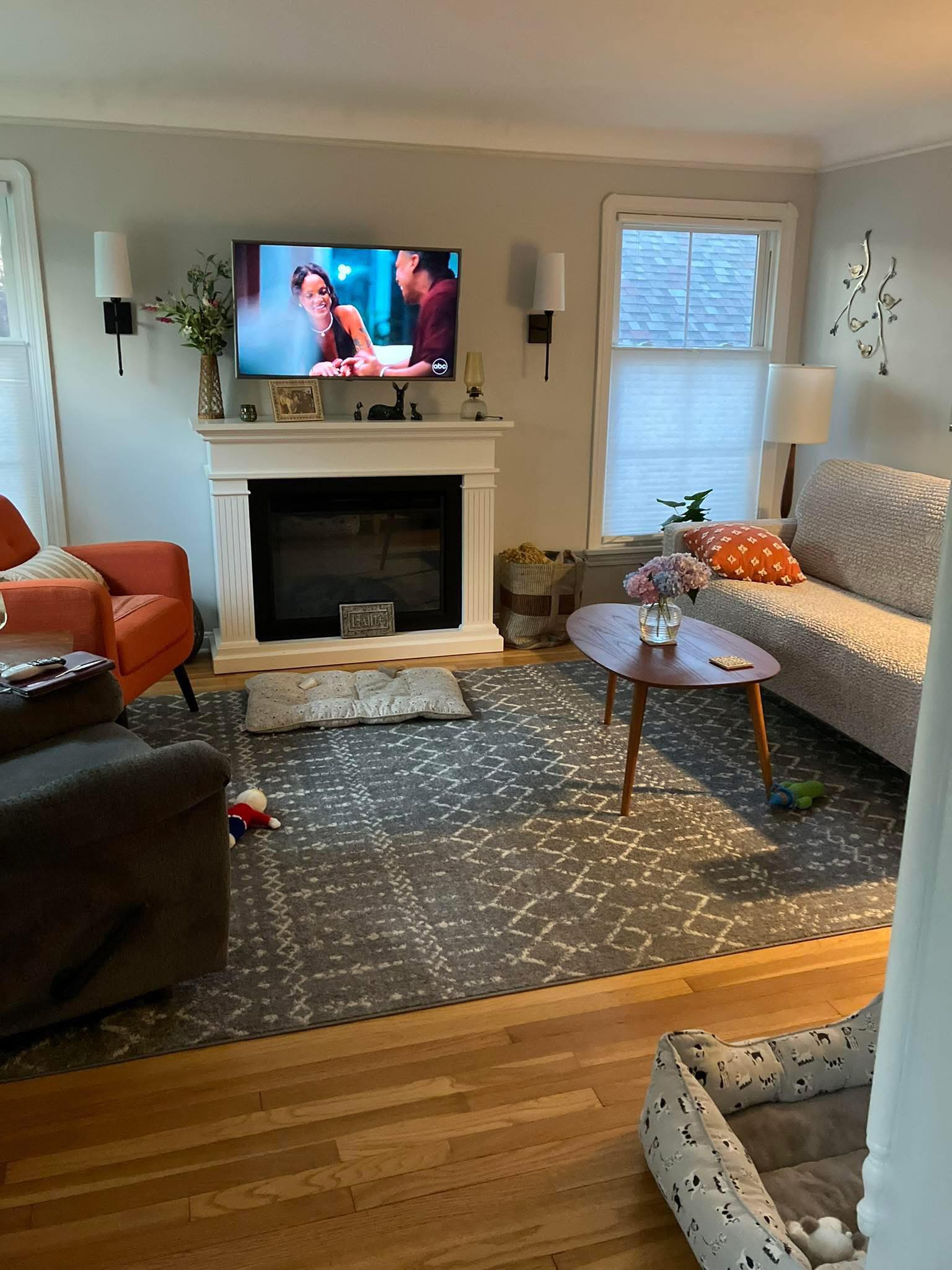 What color fabric ottoman is best for warming up a space?