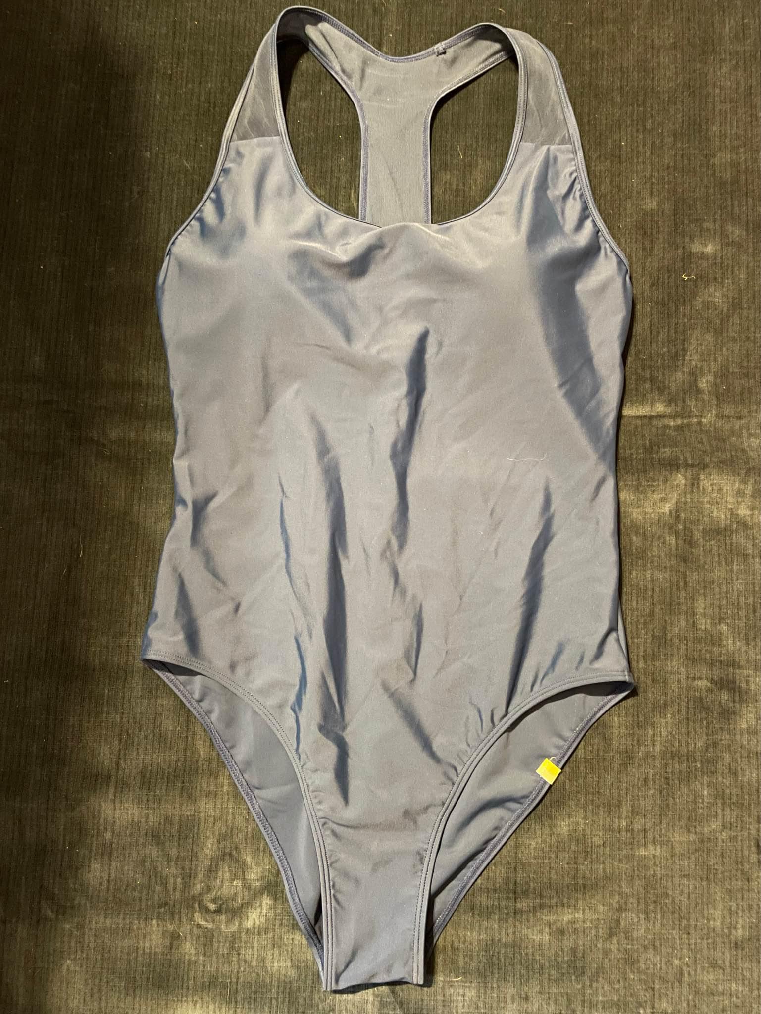 Swimming suit size medium back is translucent starchy fabric blue ...