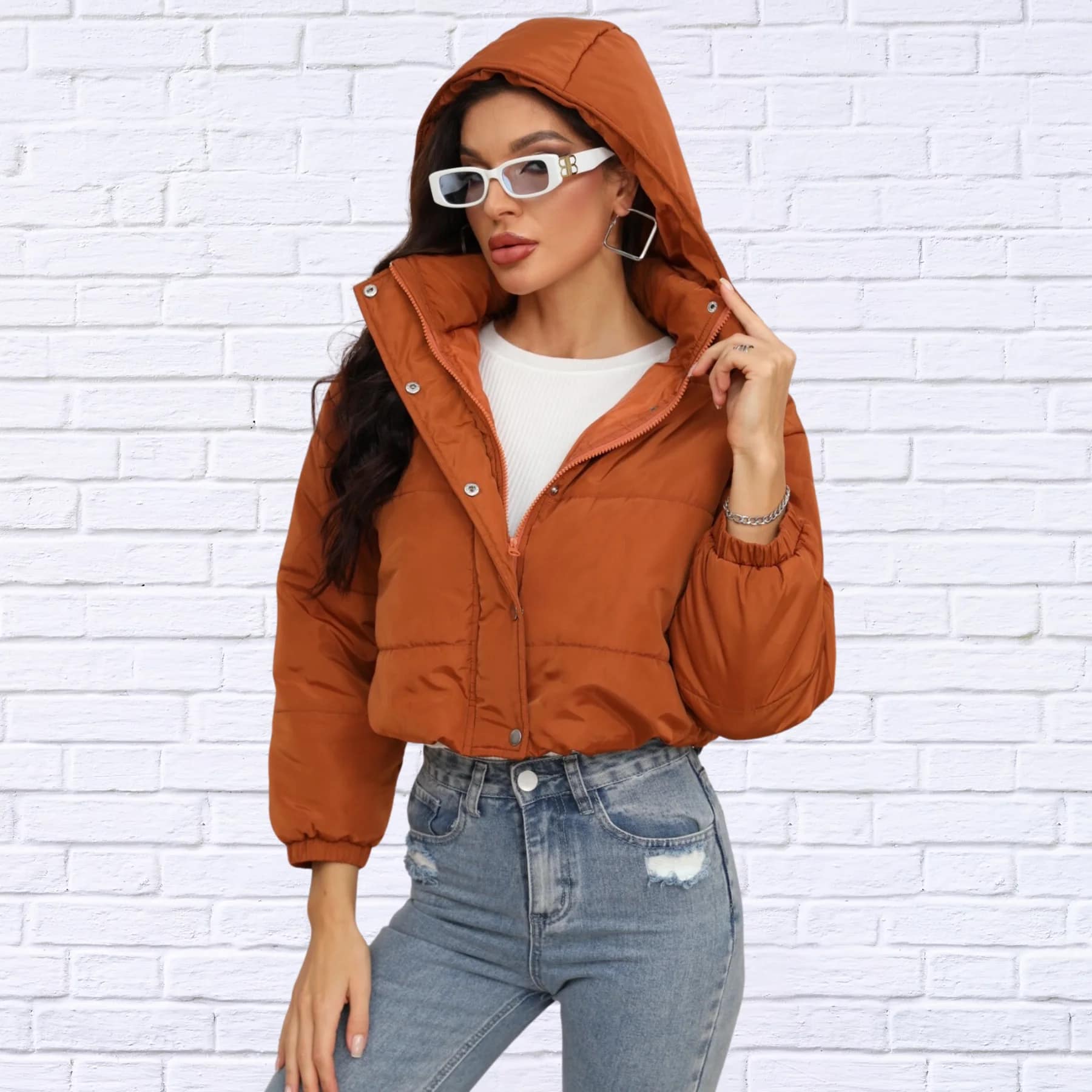 All in the detail. Our short puffer features a detachable hood and 