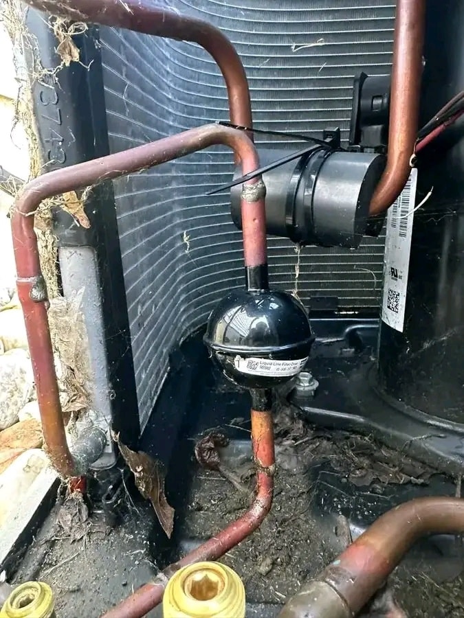 Hvac - a close-up view of an HVAC outdoor unit’s refrigeration lines ...