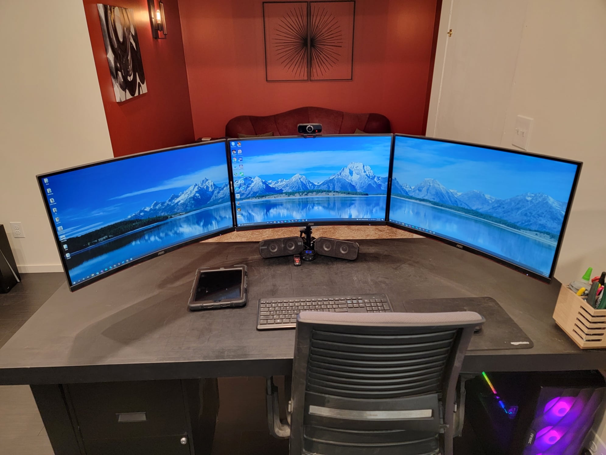 Home office setup for work and gaming with custom desk and high