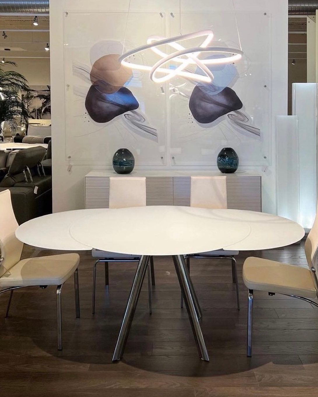 Scan - Our Davis Dining Table features an expandable matte white glass ...