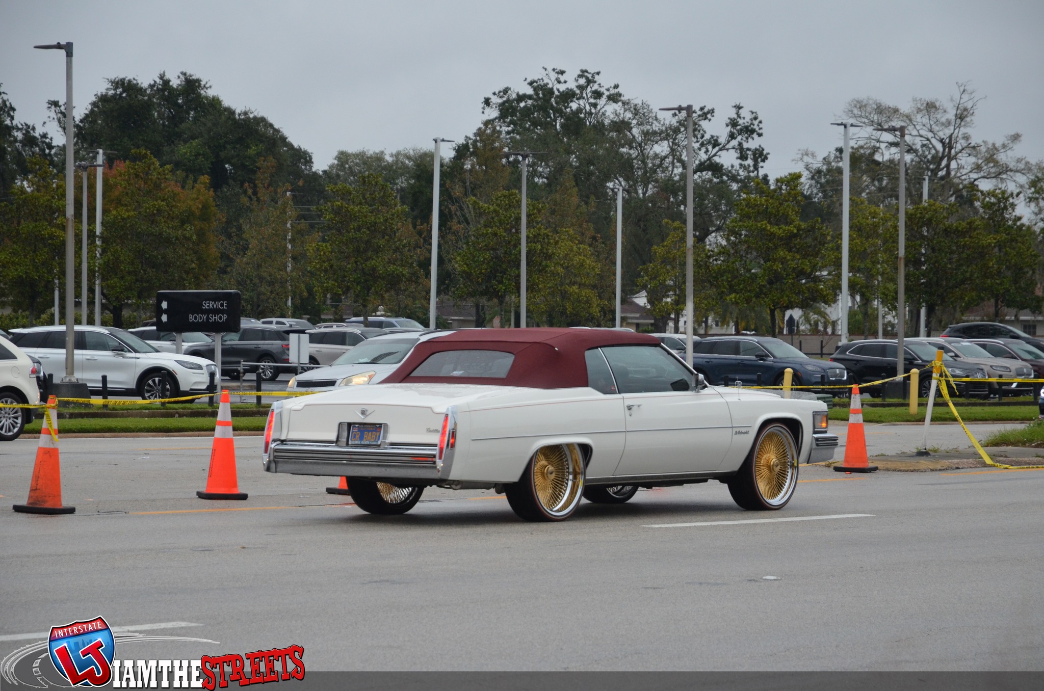 Kandy teal cadillac le cabriolet on gold Dayton wire wheels