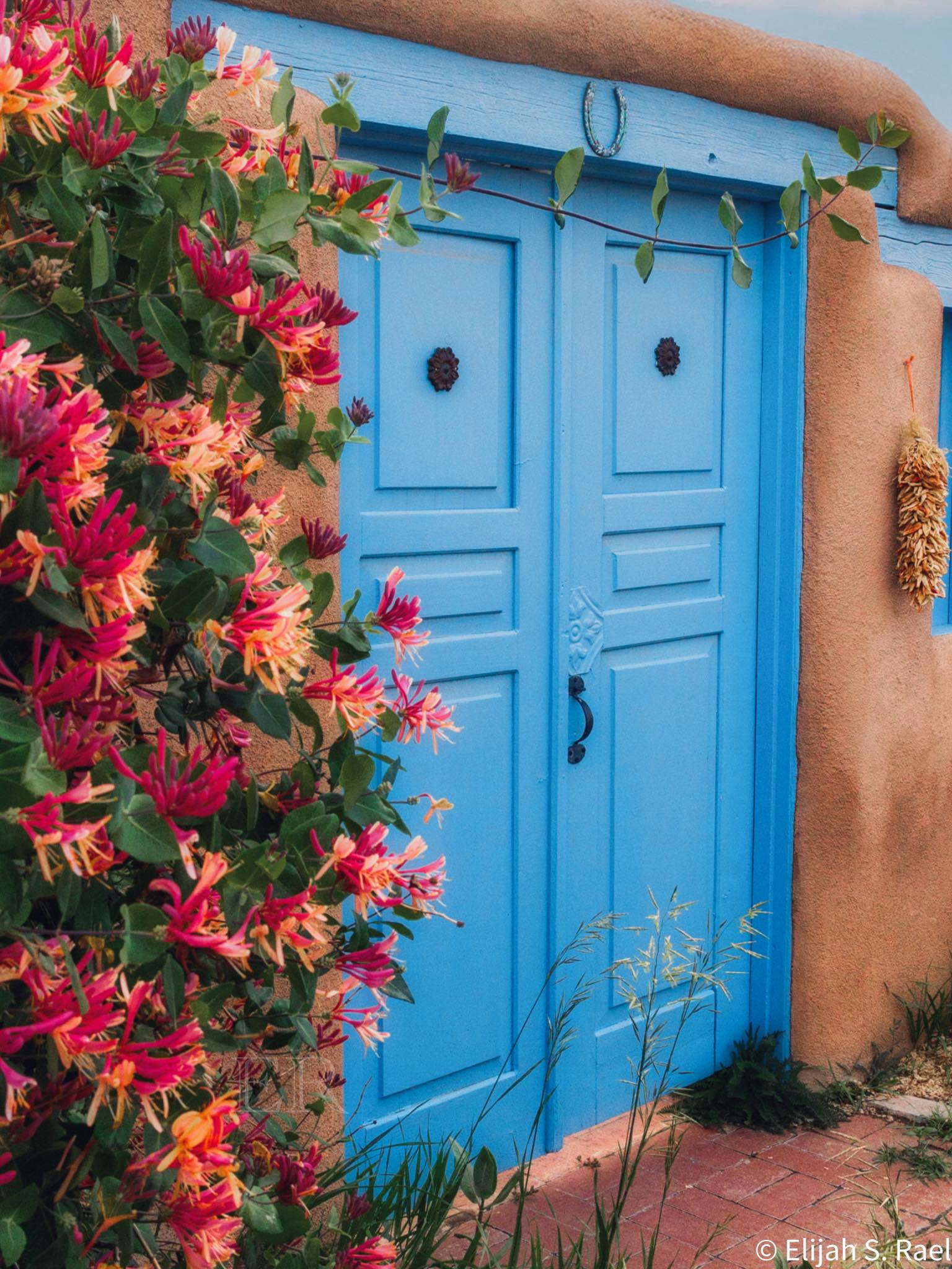Traditional adobe doorway in Ranchos de Taos, New Mexico