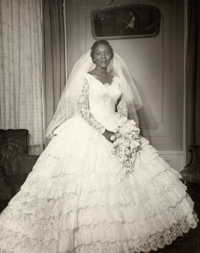 1950s bride in exquisite lace wedding ensemble