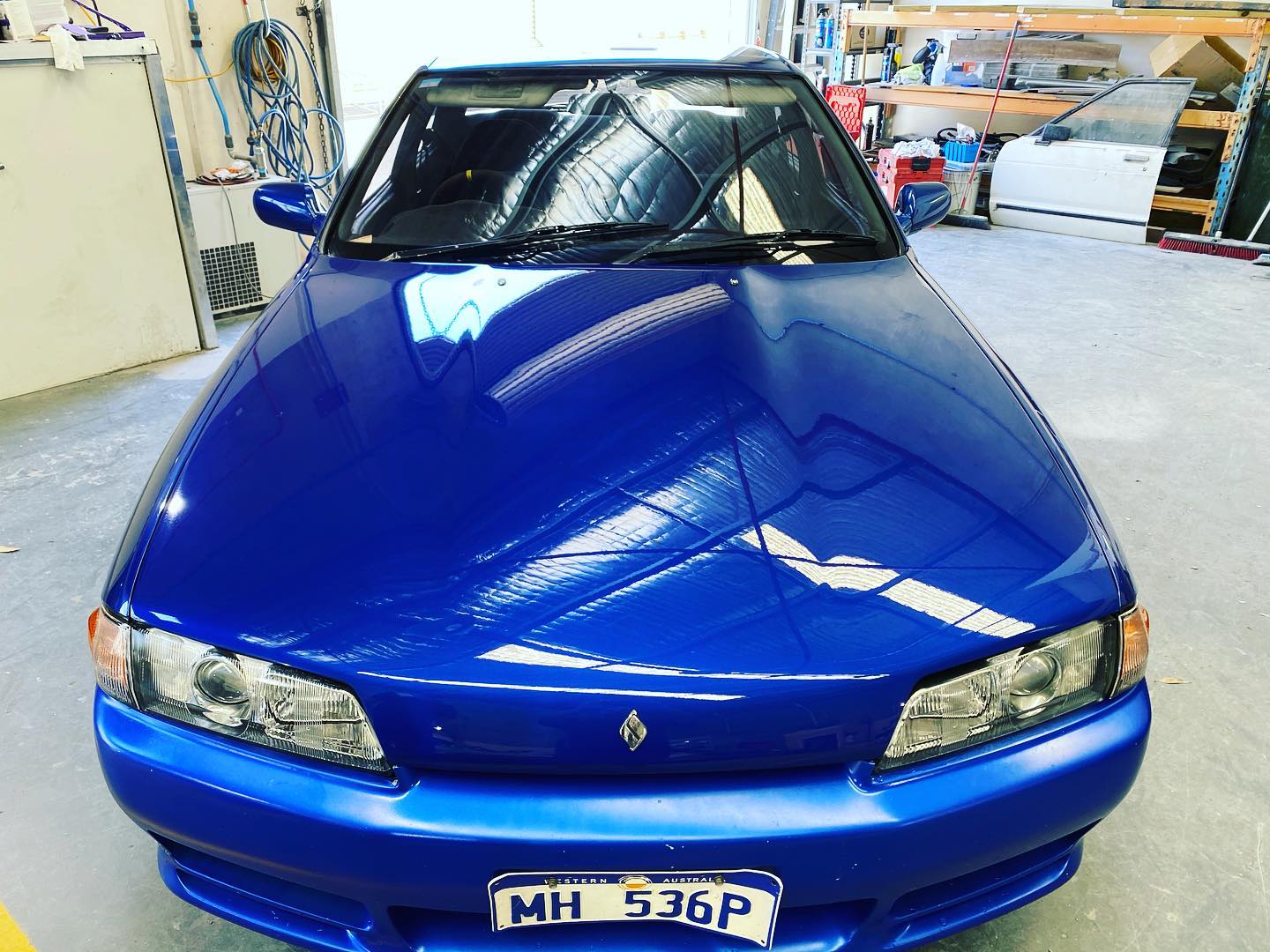 R32 bonnet repaired and painted!... - McQueen's Paint Studio
