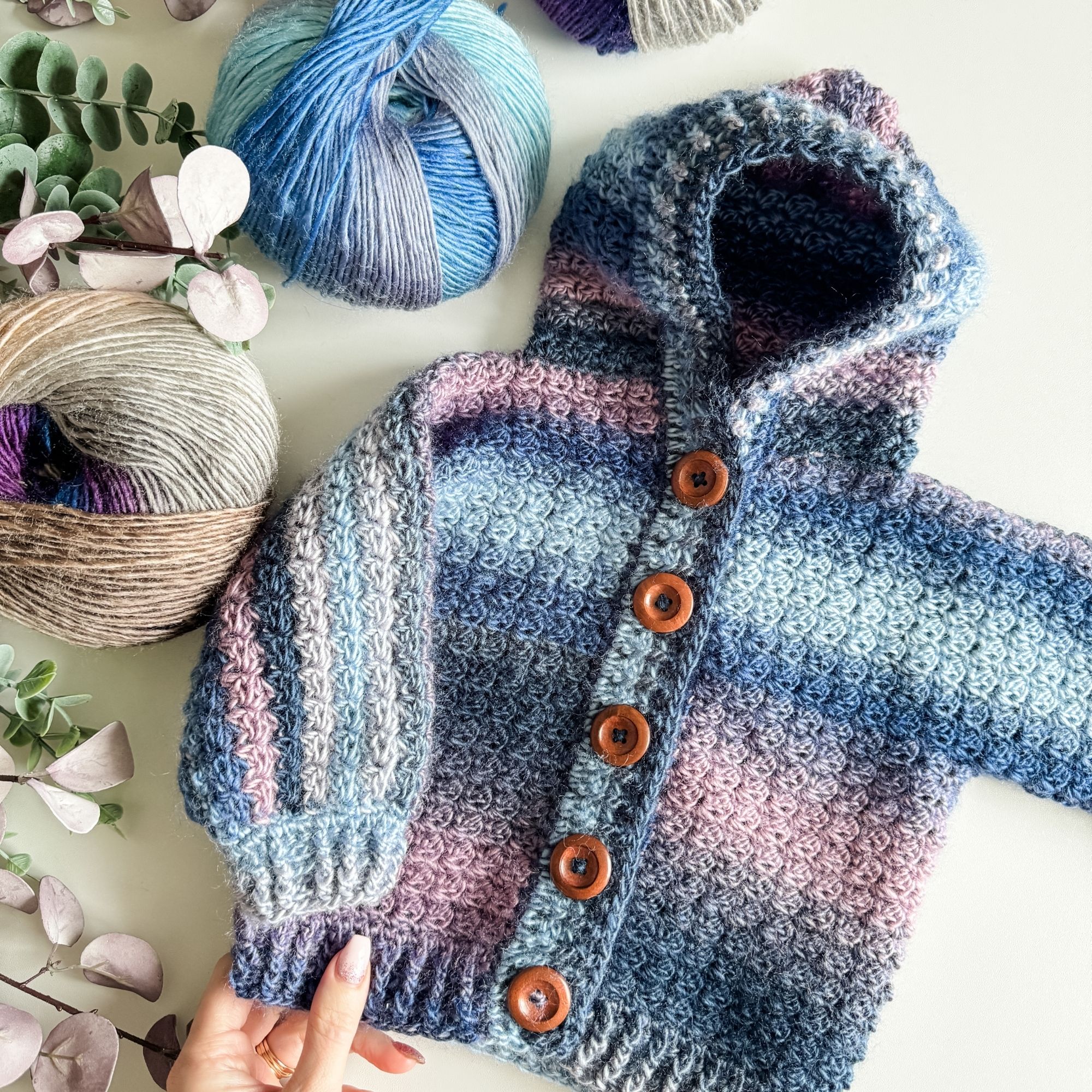 Check out the pattern for the Rainbow Hugs Hoodie Crochet Cardigan 