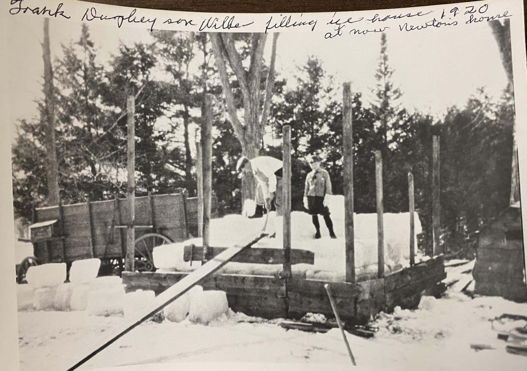 Hartland - Wilber Durphy filling the ice house in 1920 | Facebook