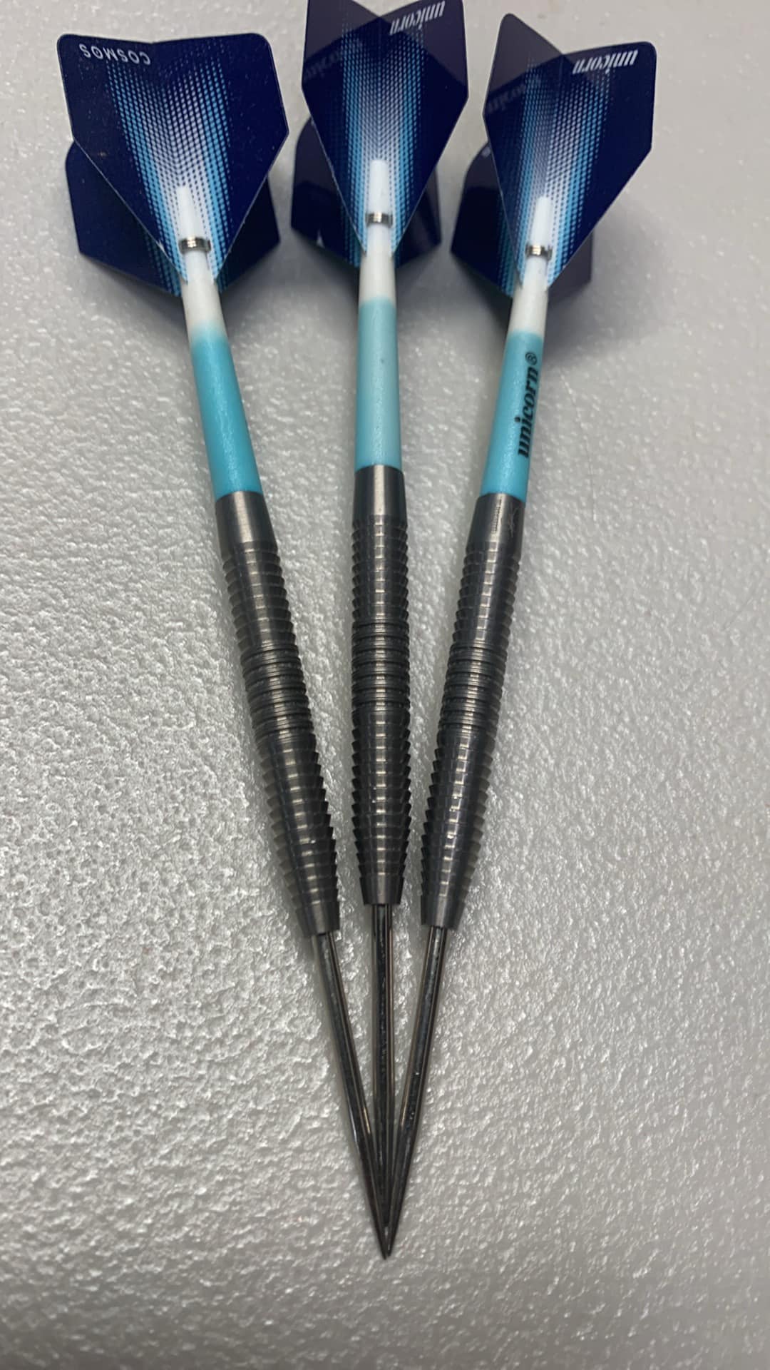 What is the signature on this unicorn dart set?