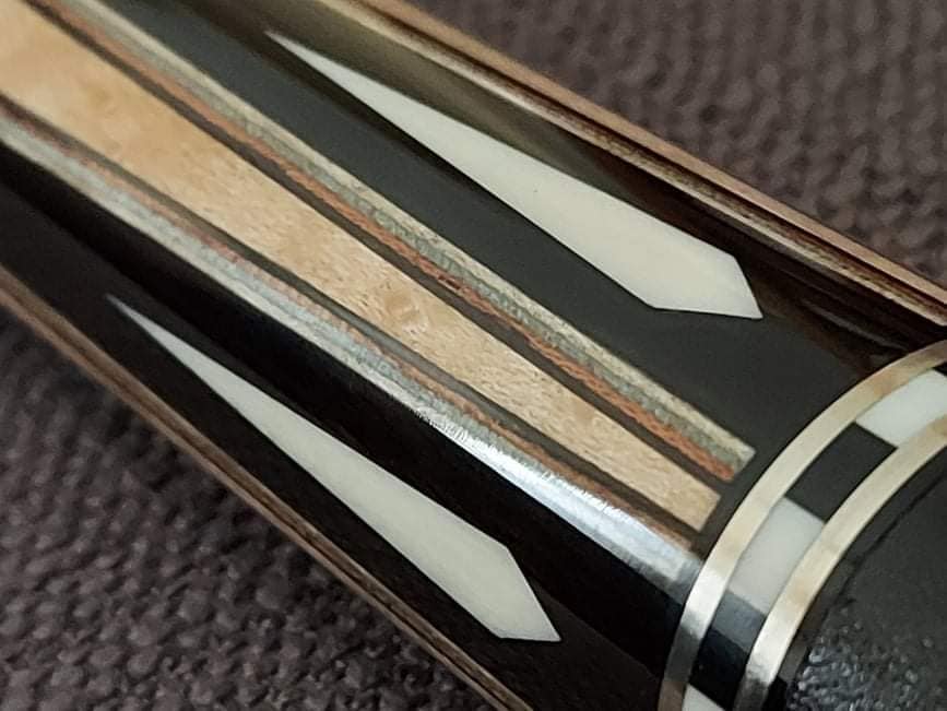 Rare early Omega DPK cue
