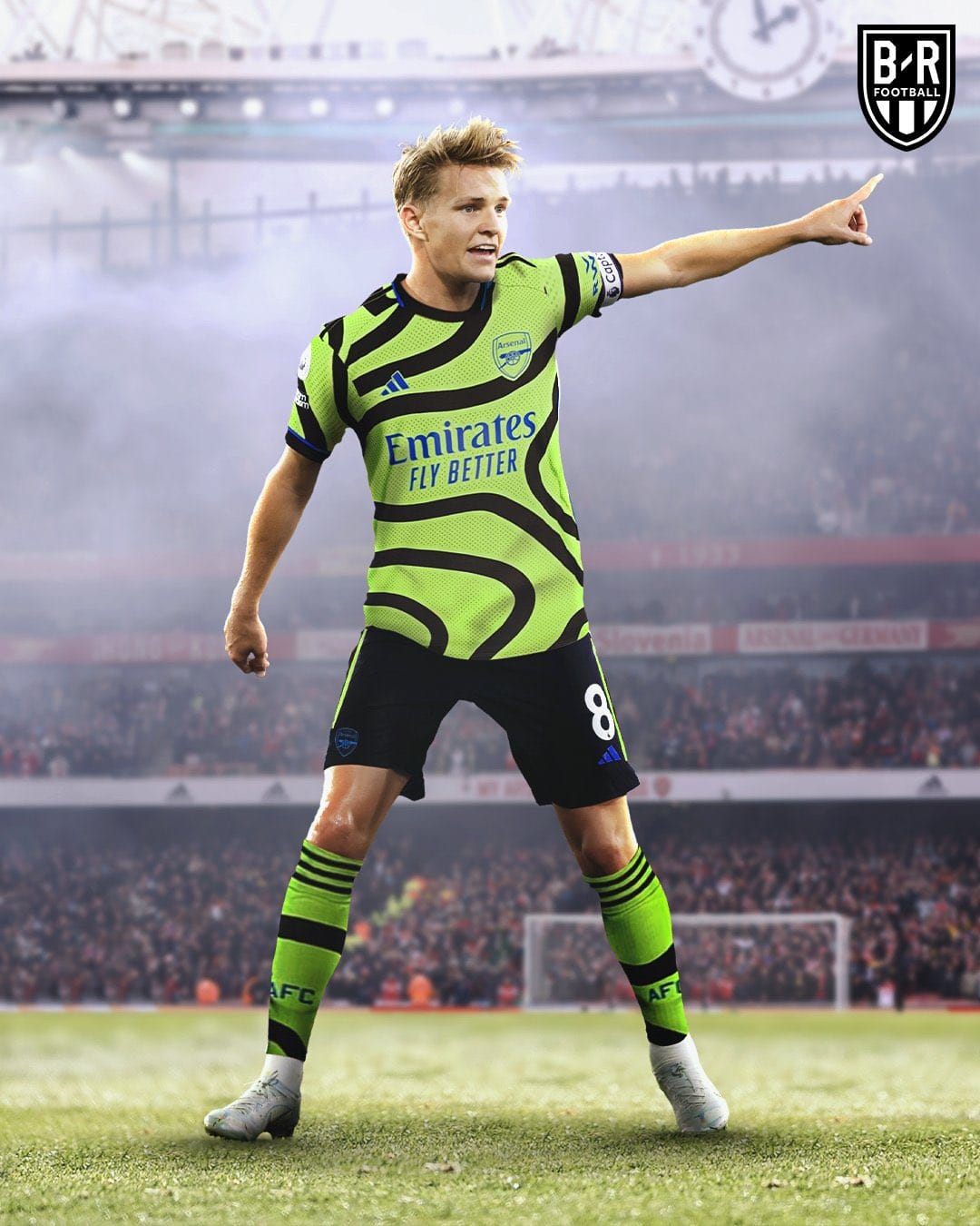 Takehiro Tomiyasu models Arsenal's new away kit for the 2022/23