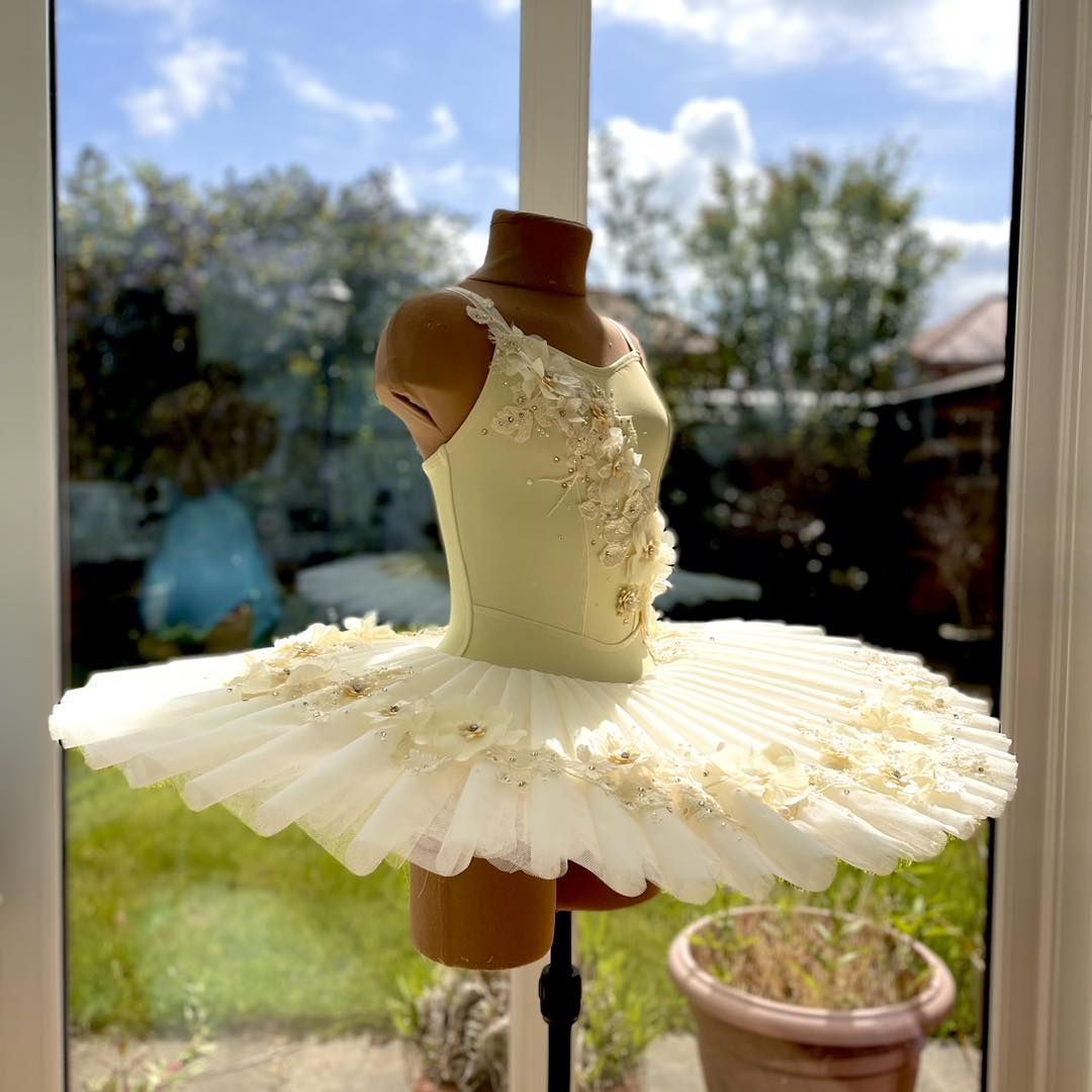 a ballet dancer dressed in a golden yellow tutu Delighted to meet the little ballerina who has taken this sweet away! 💛 Found this warm, primrose fabric for the bodice little fabric shop recently and it's so inexpensive wedding dresses