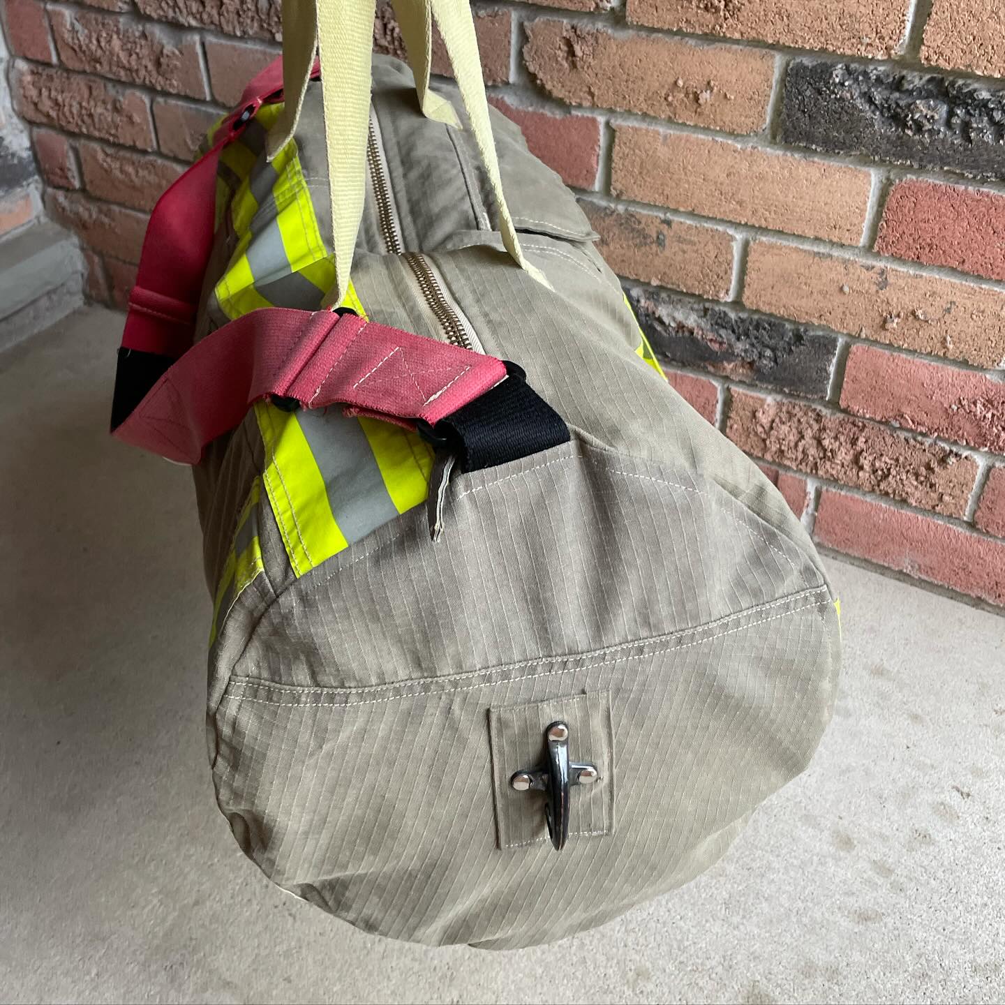 Upcycled firefighter gear duffle bag