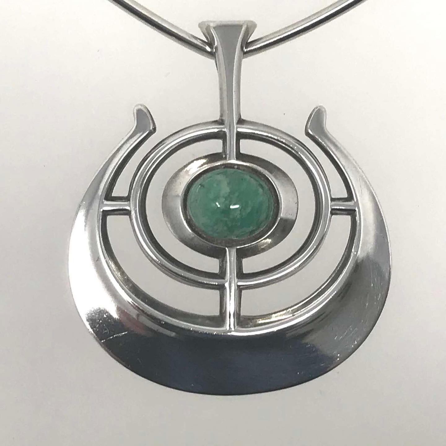This beautiful pendant is known as 'Ship of Good Fortune'. It was