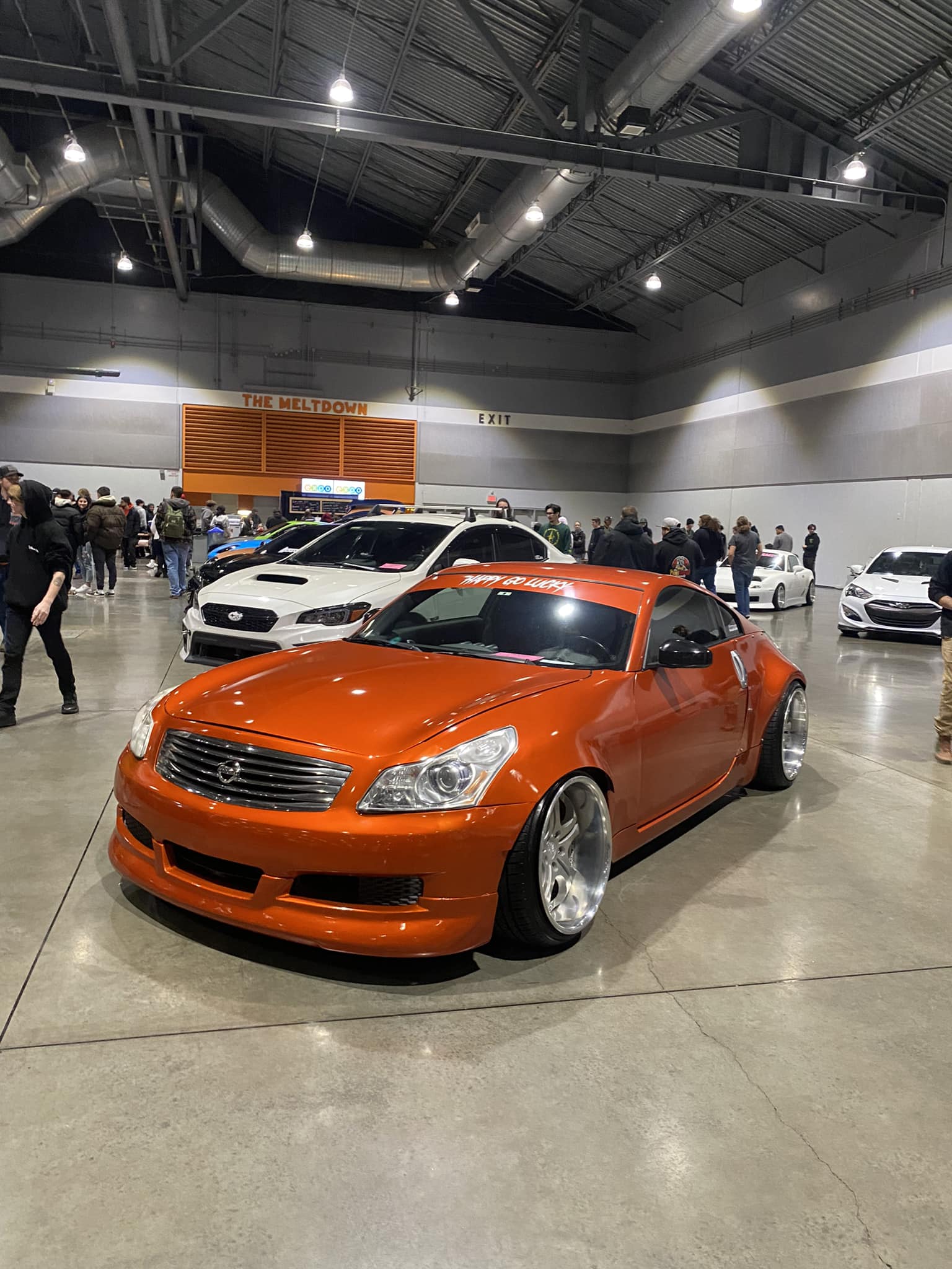 Nissan 350Z with an Infiniti G37 front end. Pics via usedcarnews.jp