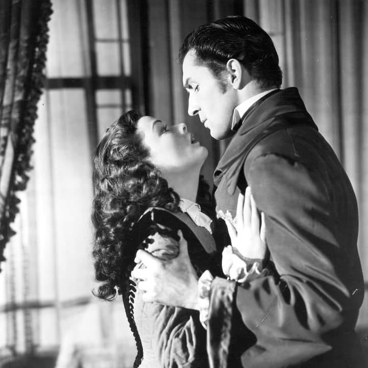 Turner Classic Movies Fan Site | The burgundy robe with satin sash worn ...