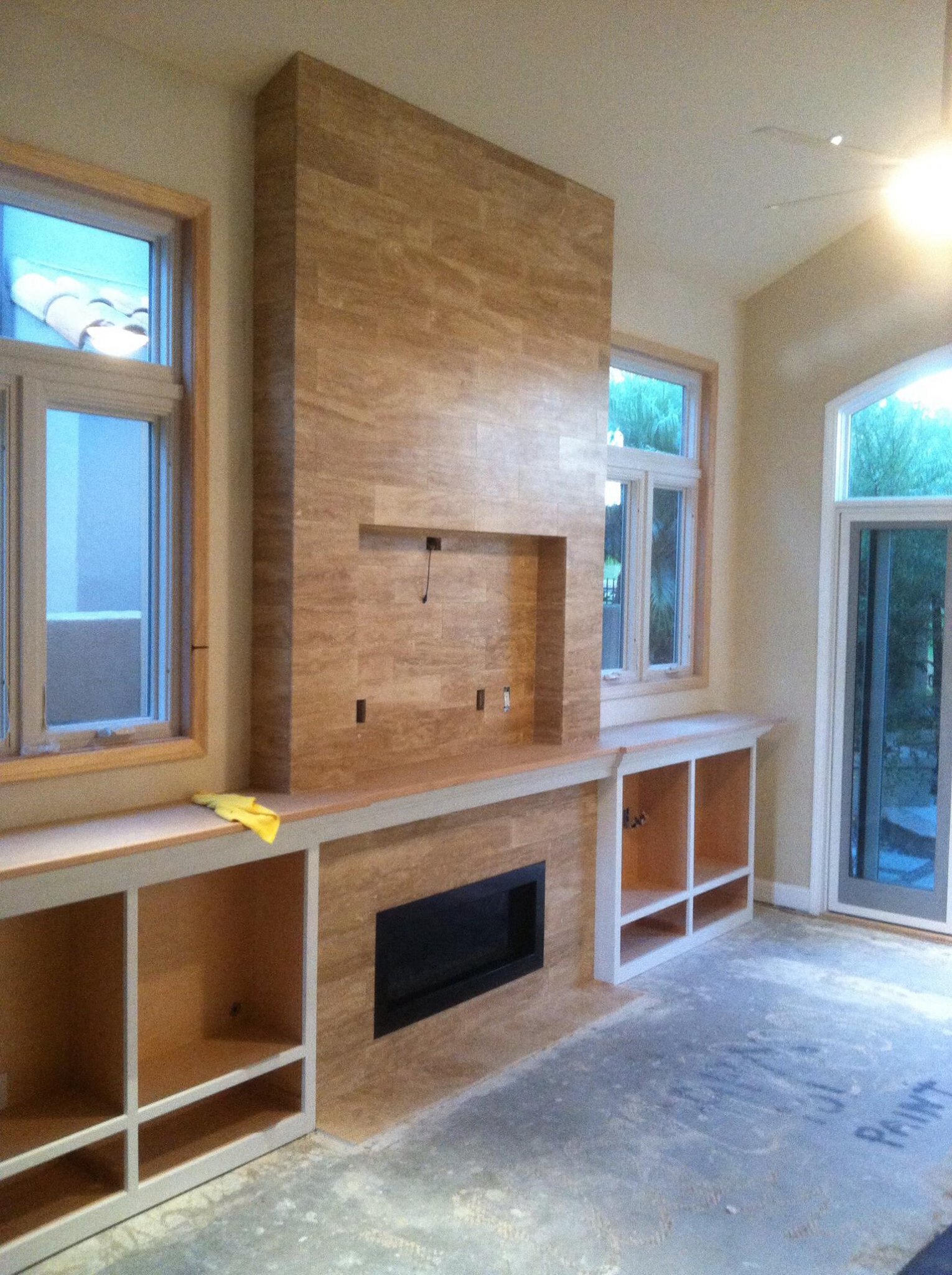 14' fireplace with recess for TV. - Kohler Tile & Remodel