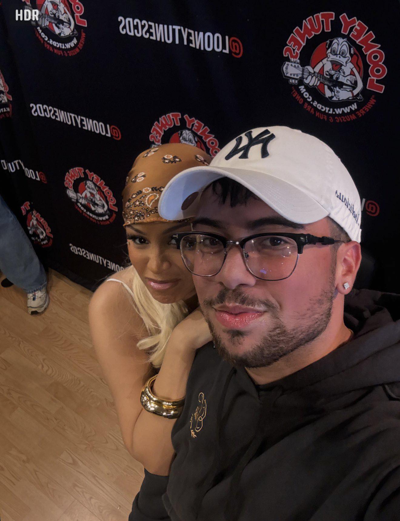 Female - Cardi B posing with a fan at her Meet & Greet today. | Facebook