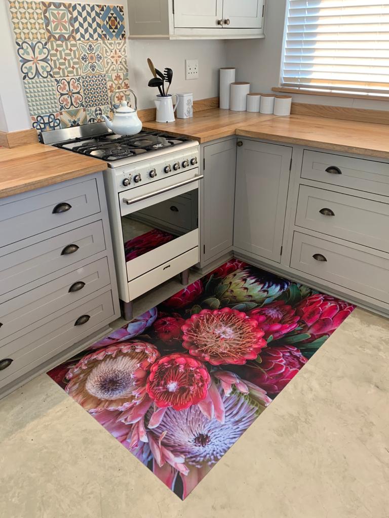 The Anna's Protea Bunch Vinyl Rug by... - AubergineFoods.com | Facebook