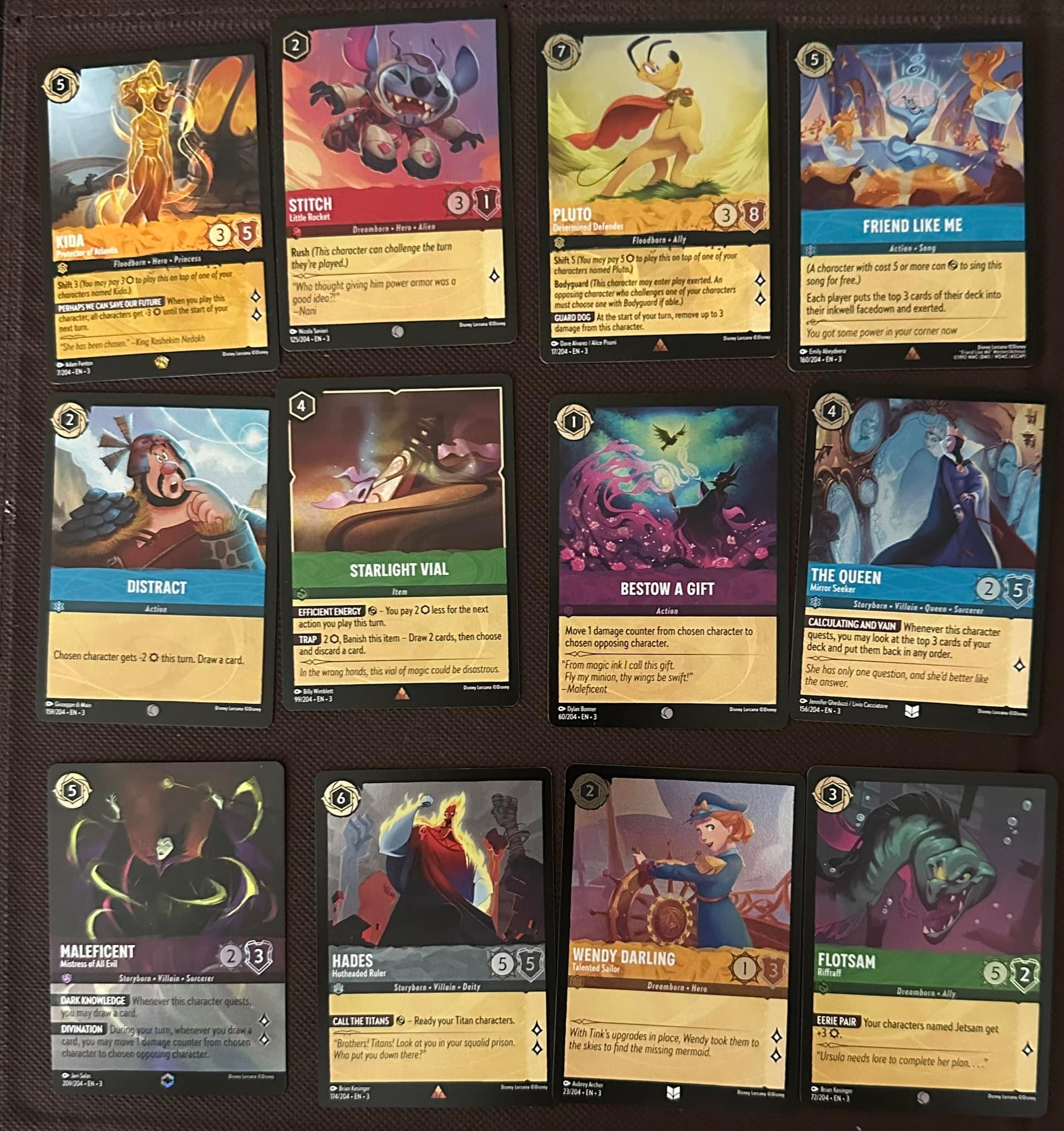 how many enchanted cards in lorcana booster box Ravensburger Disney TCG: Whispers The Well Illumineer's Trove - Secure Card Storage - Includes Packs & Comprehensive Guide - Original Disney Artwork each player will need a deck of sixty cards How many enchanted cards are